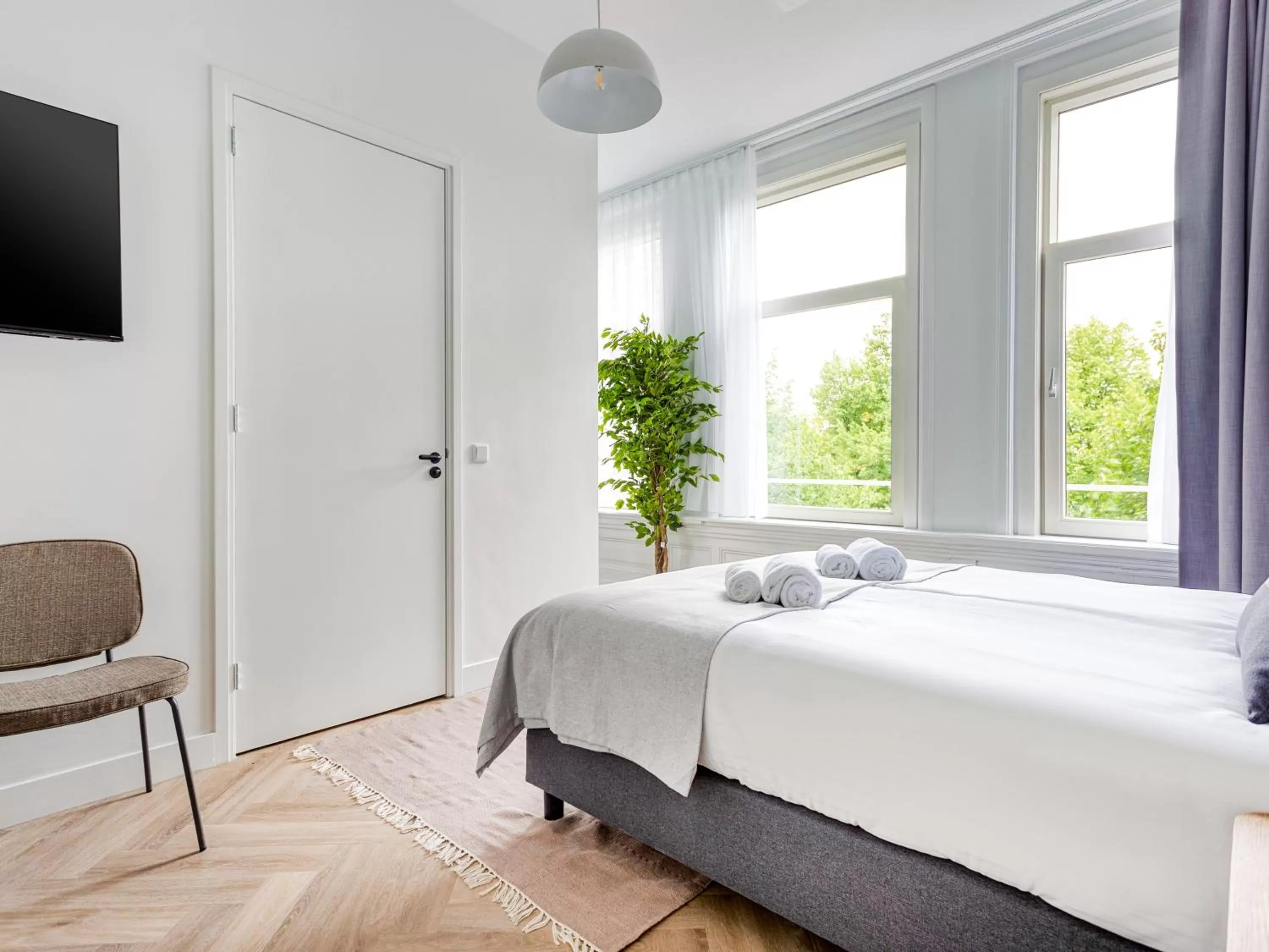 Bed in City Rooms Amsterdam Hemonystraat - Digital access