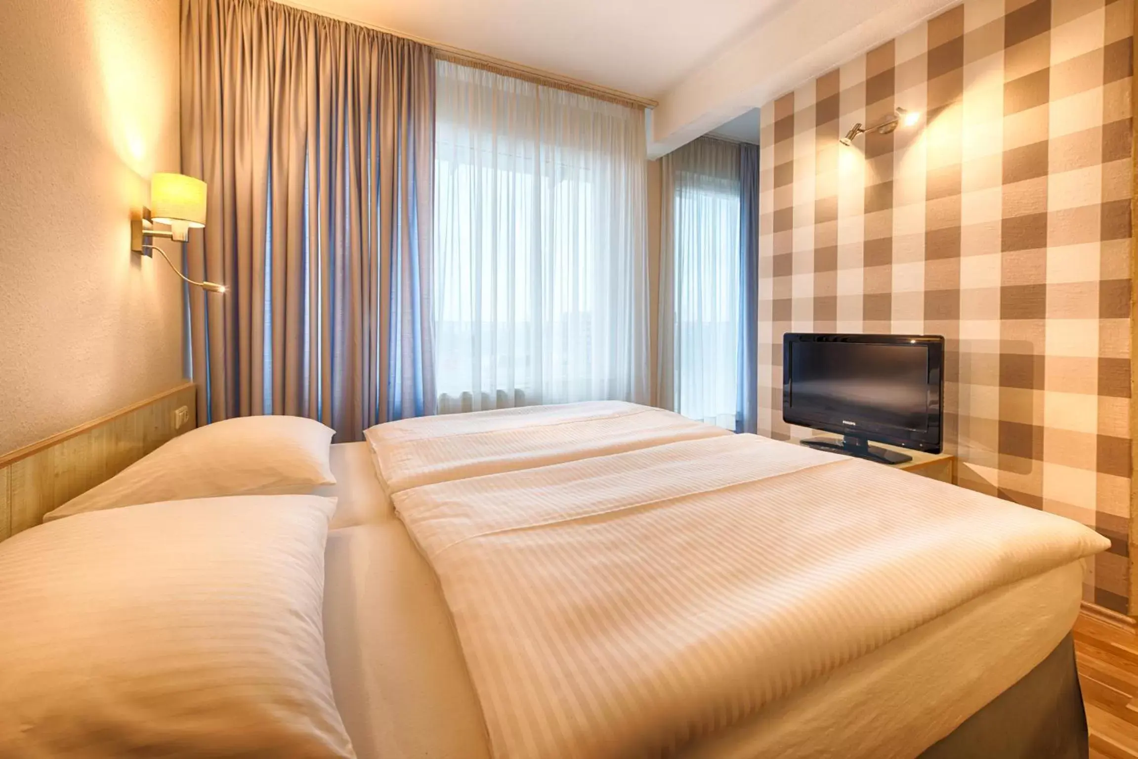 TV and multimedia, Bed in enjoy hotel Berlin City Messe