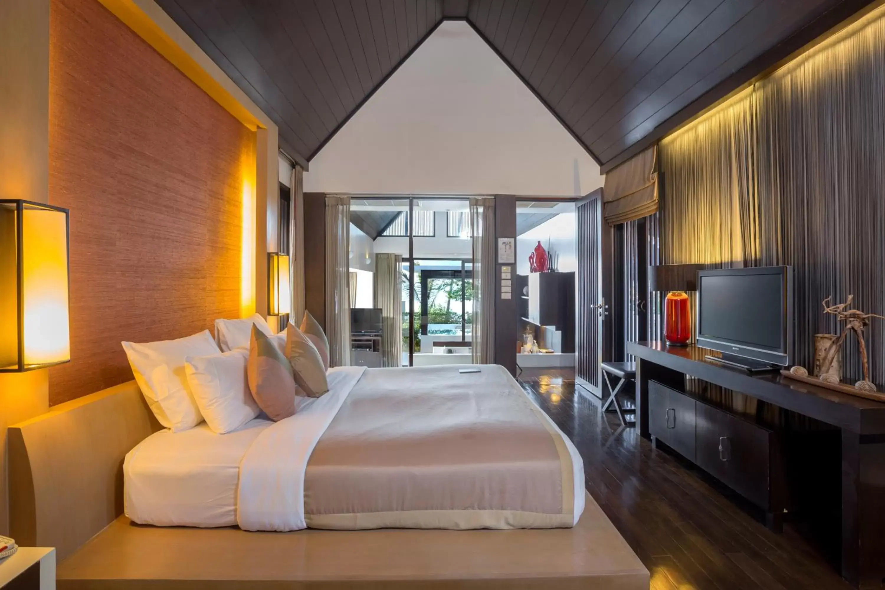 Bed, TV/Entertainment Center in The Sea Koh Samui Resort and Residences by Tolani - SHA Extra Plus