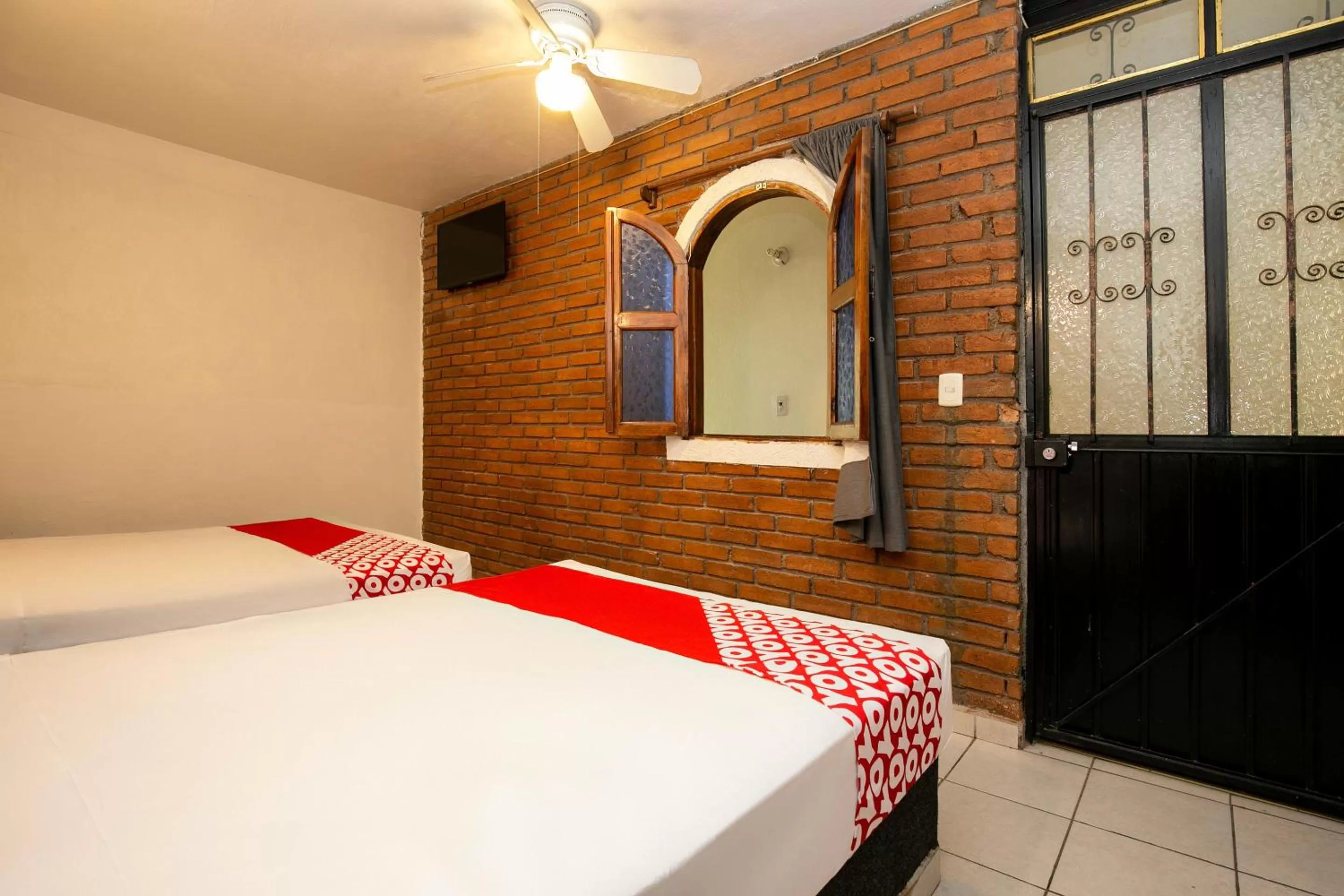 Bedroom in OYO La Casita