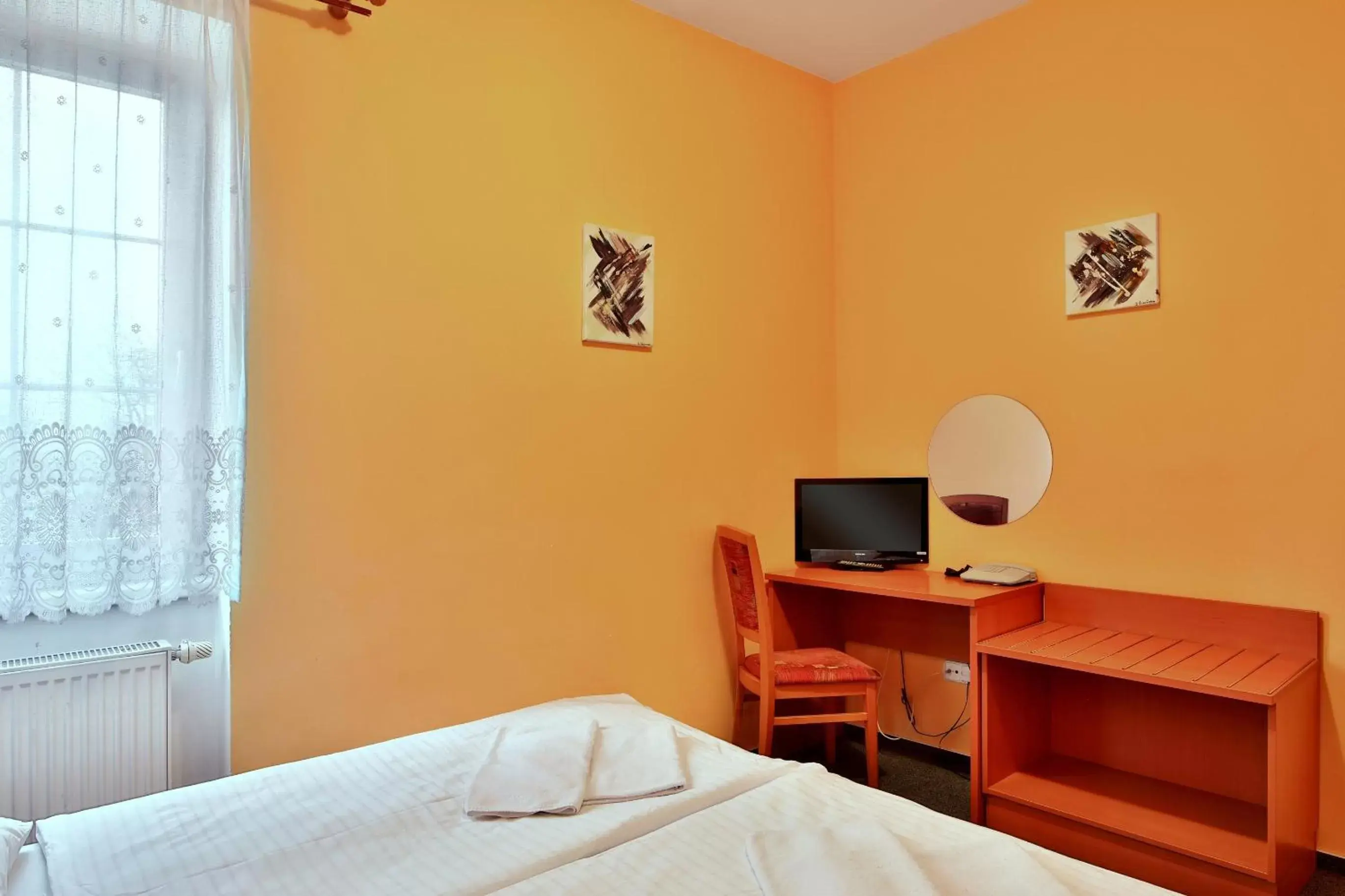 Seating area, Bed in Attic Hotel