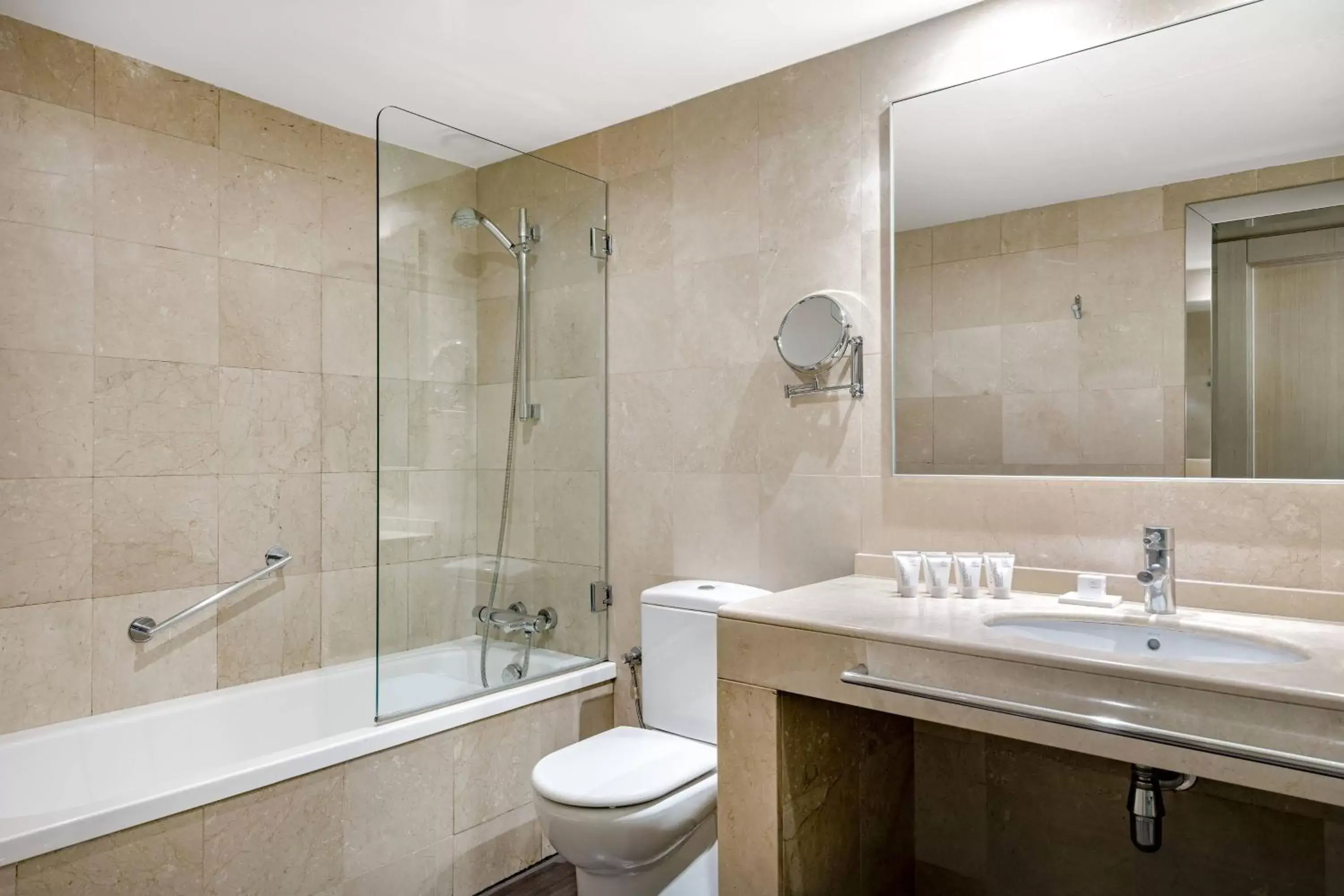 Bathroom in AC Hotel Victoria Suites by Marriott