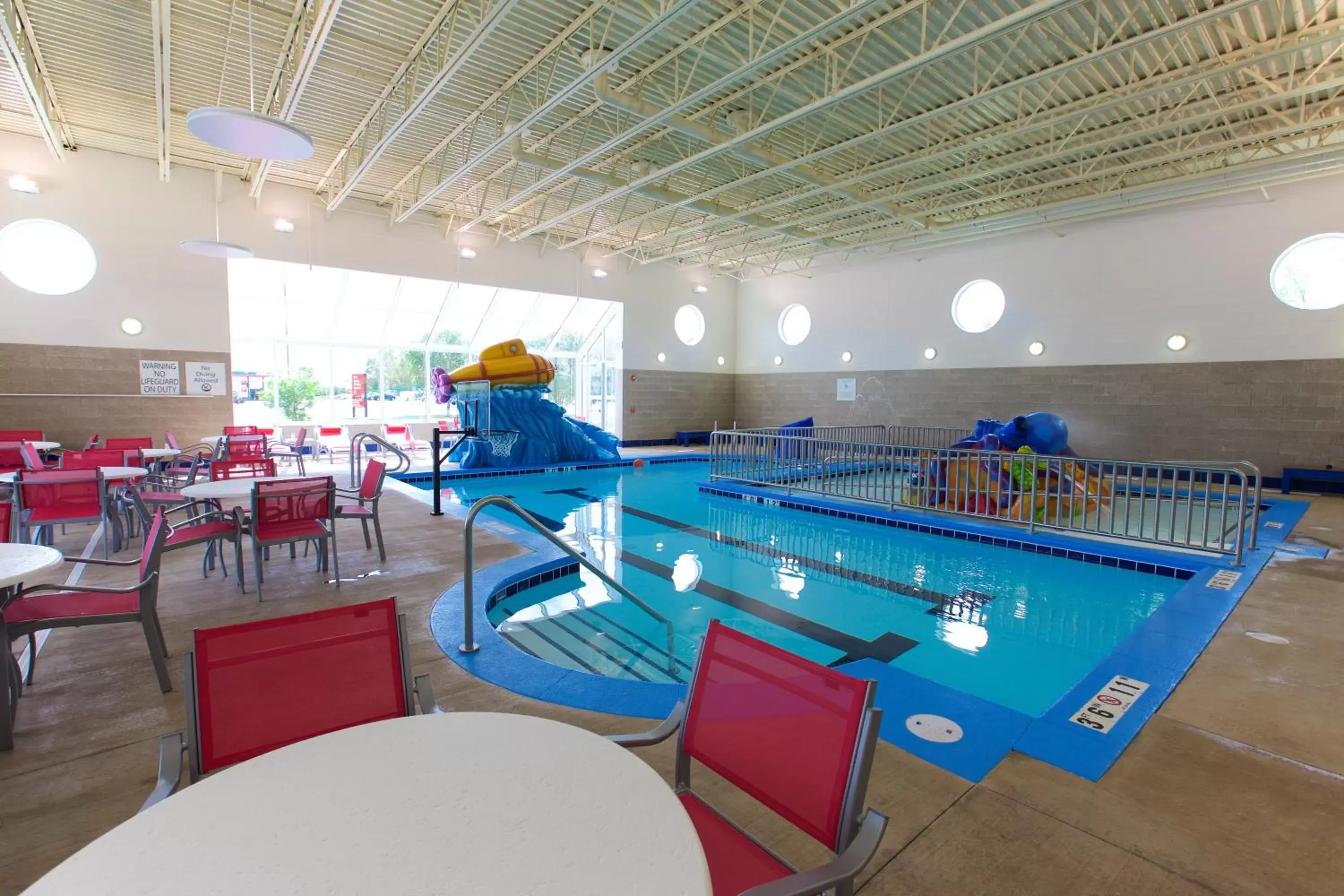 Swimming pool in Holiday Inn Express Fargo SW I94 Medical Center, an IHG Hotel