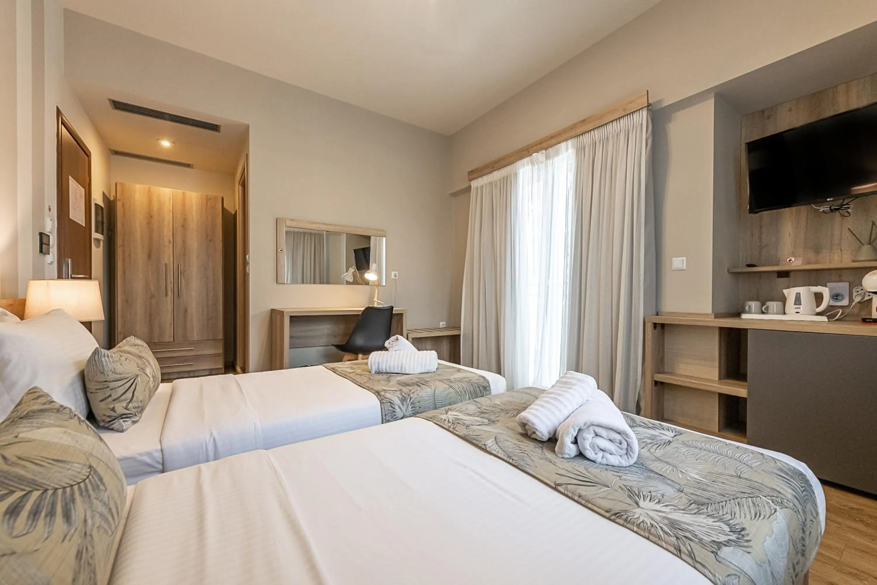 Bed in Hotel @Syngrou Fix