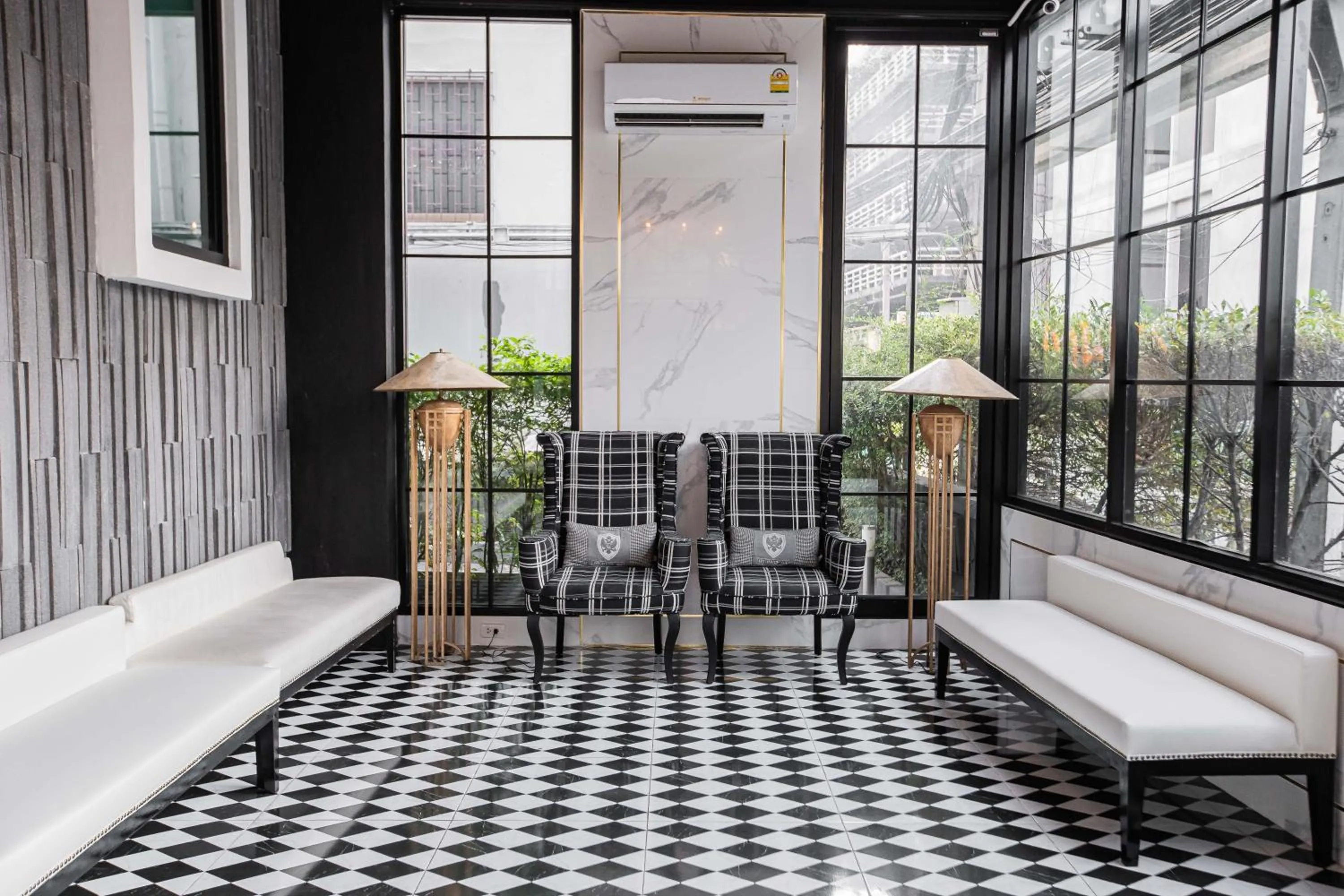 Living room in Marigold Sukhumvit - Free Shuttle to BTS Bearing Station