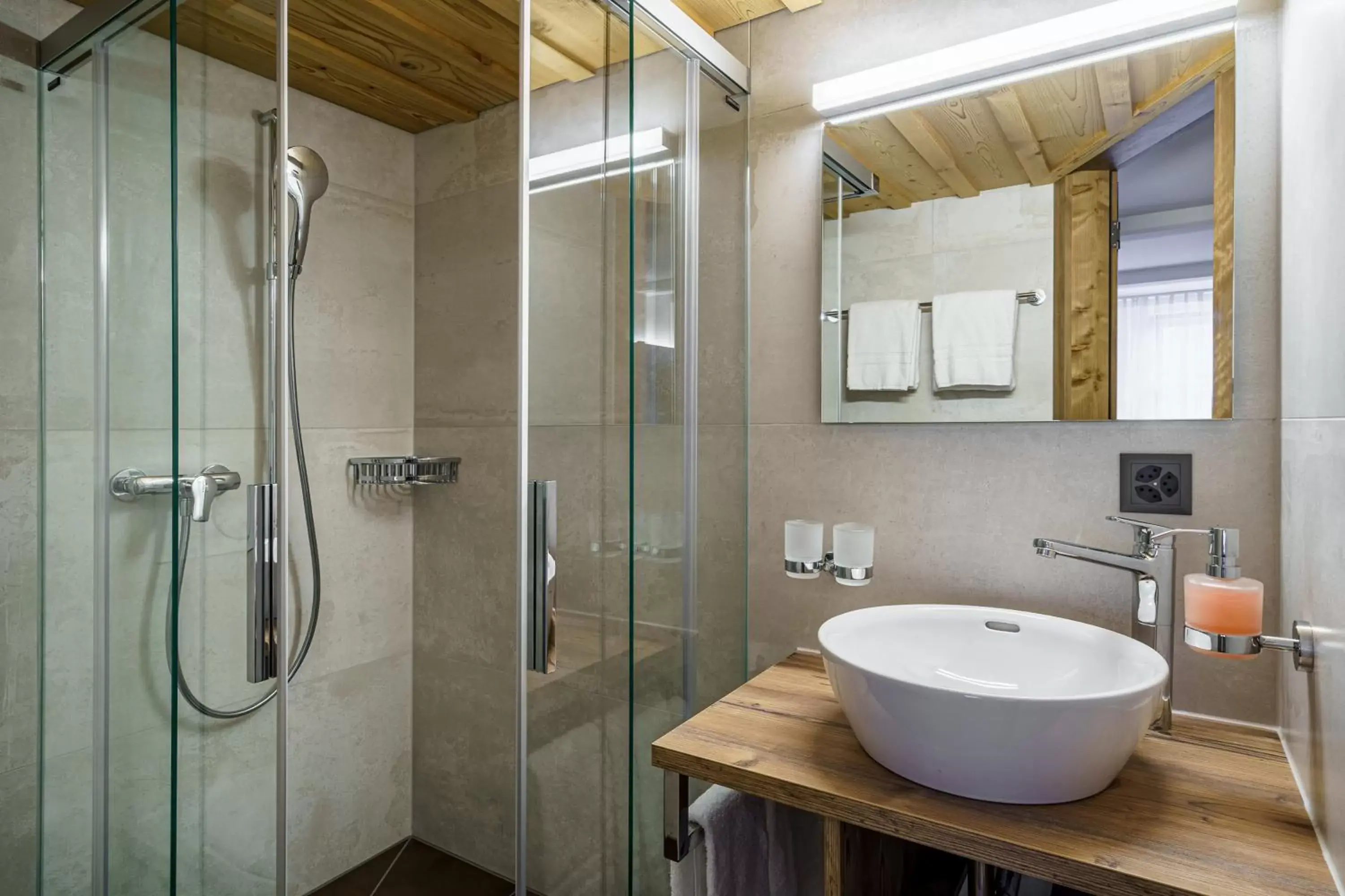 Bathroom in Alpenblick Hotel & Restaurant Wilderswil by Interlaken