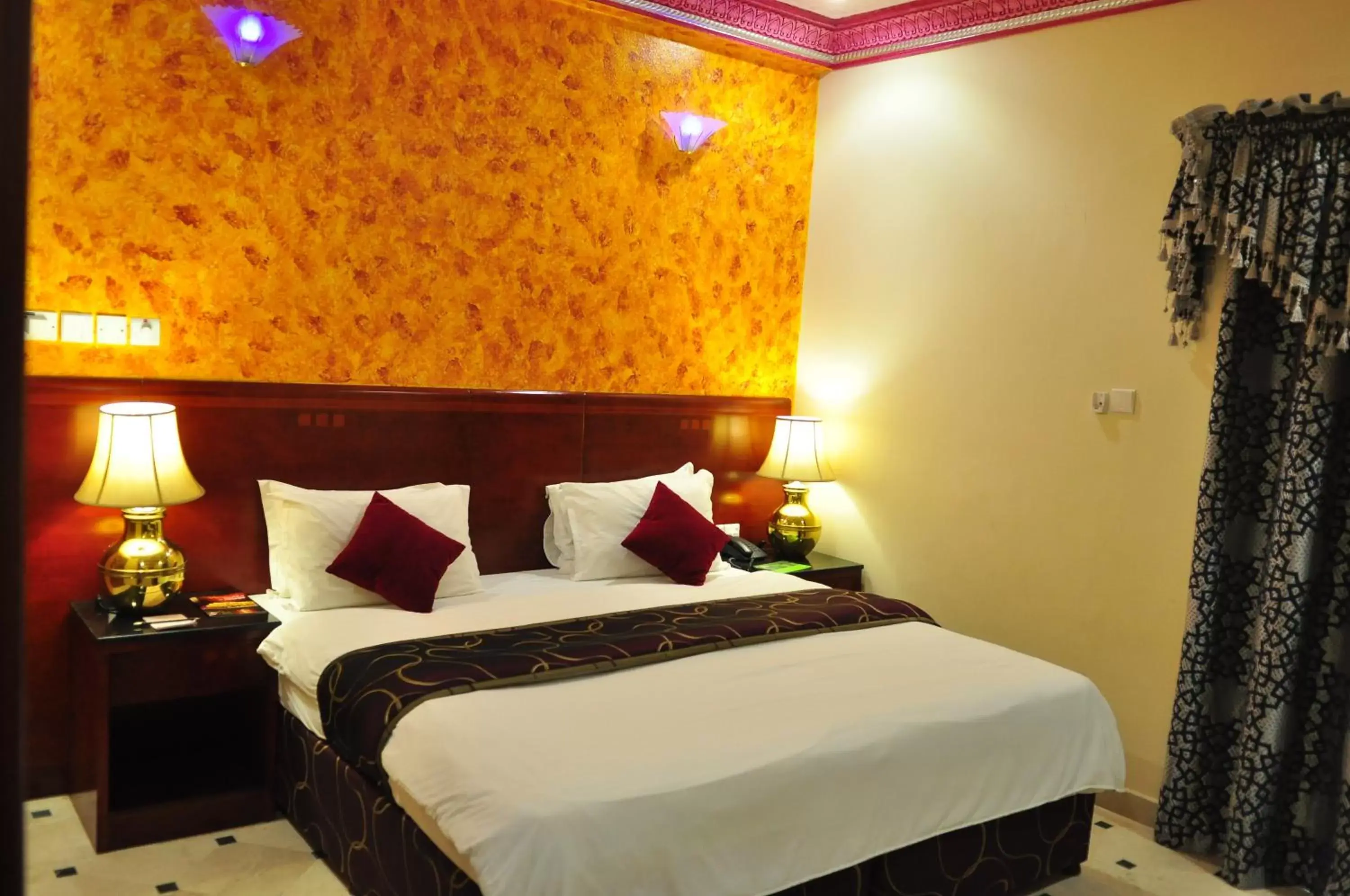 Bed, Room Photo in Al Bahjah Hotel