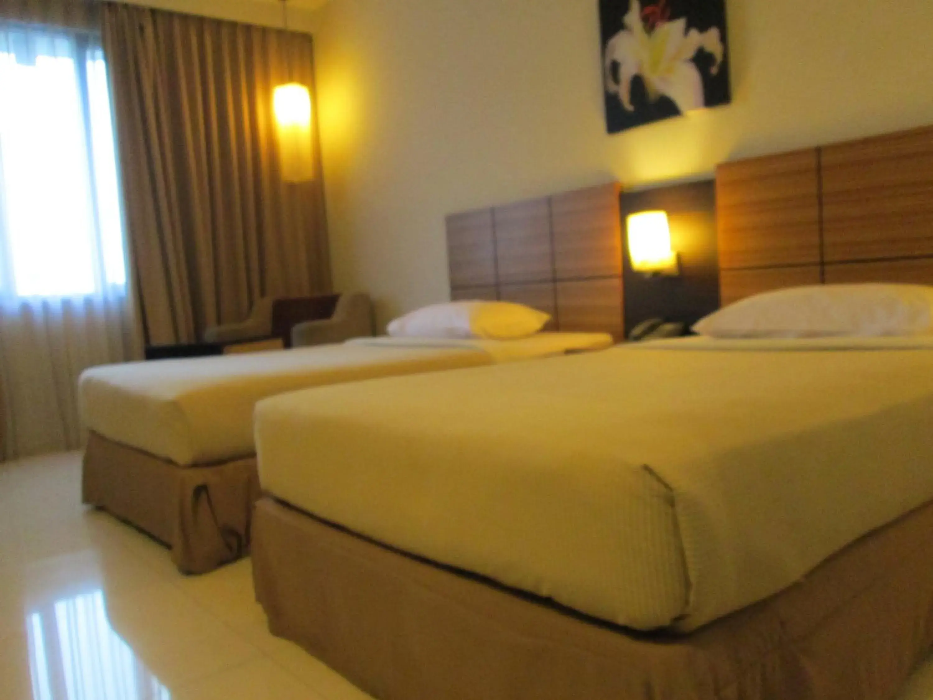 Bed in Hotel Kini Pontianak Bed in Hotel Kini Pontianak