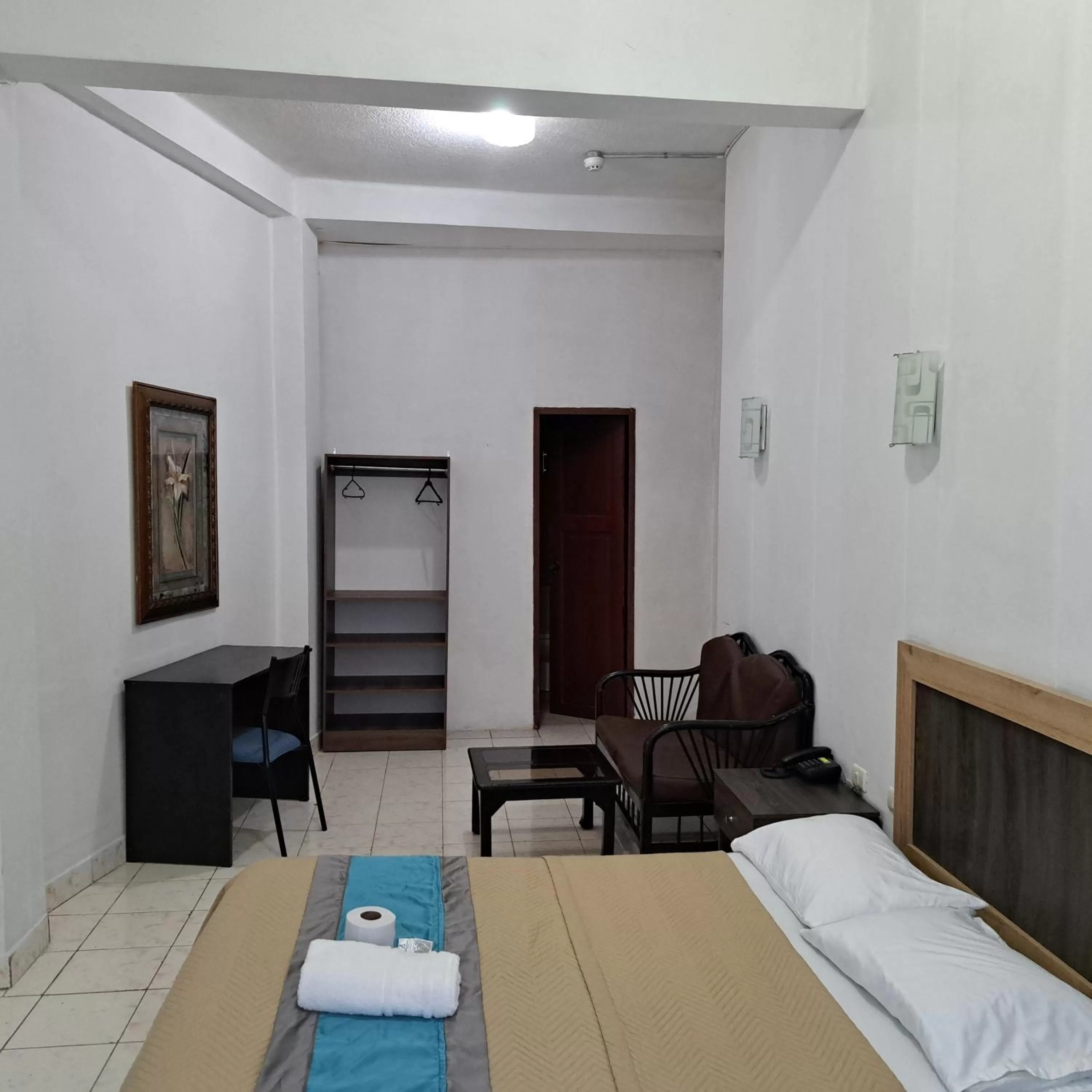 Photo of the whole room, Bed in Atlantic Suites Hotel