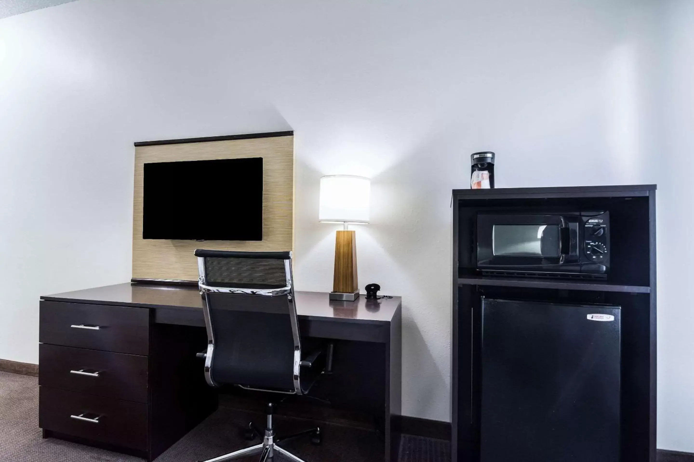 Photo of the whole room, TV/Entertainment Center in Sleep Inn & Suites Smithfield near I-95