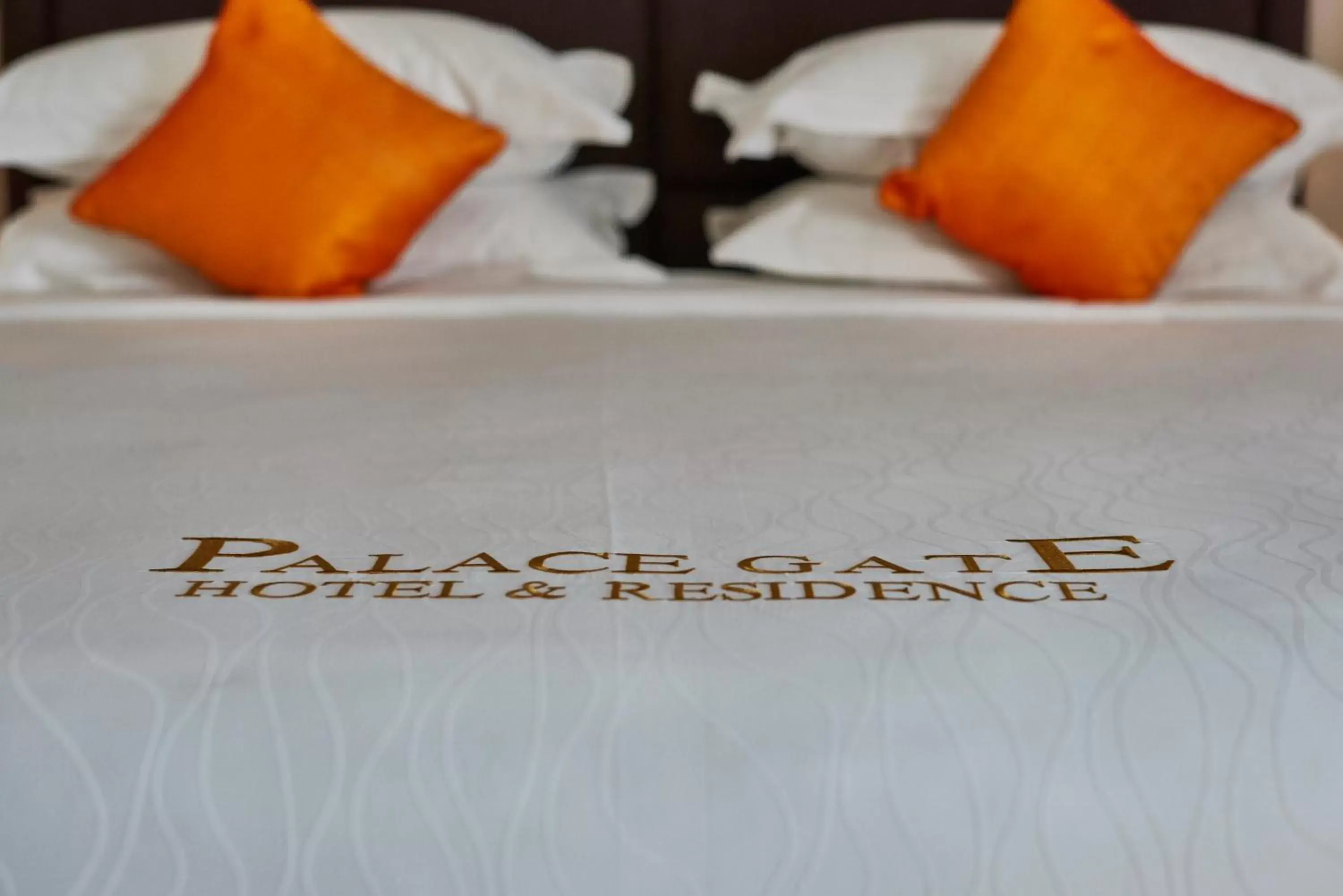 Bed in Palace Gate Hotel & Residence