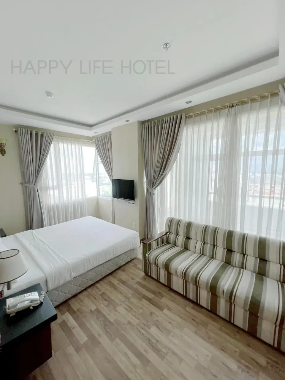 Photo of the whole room in Happy Life Hotel