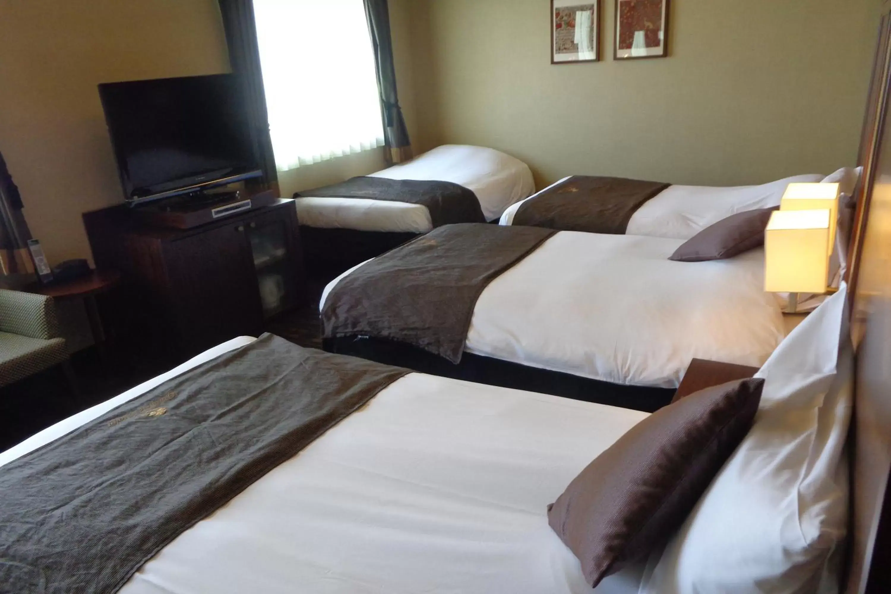 Bedroom, Bed in Hotel Monterey Grasmere Osaka