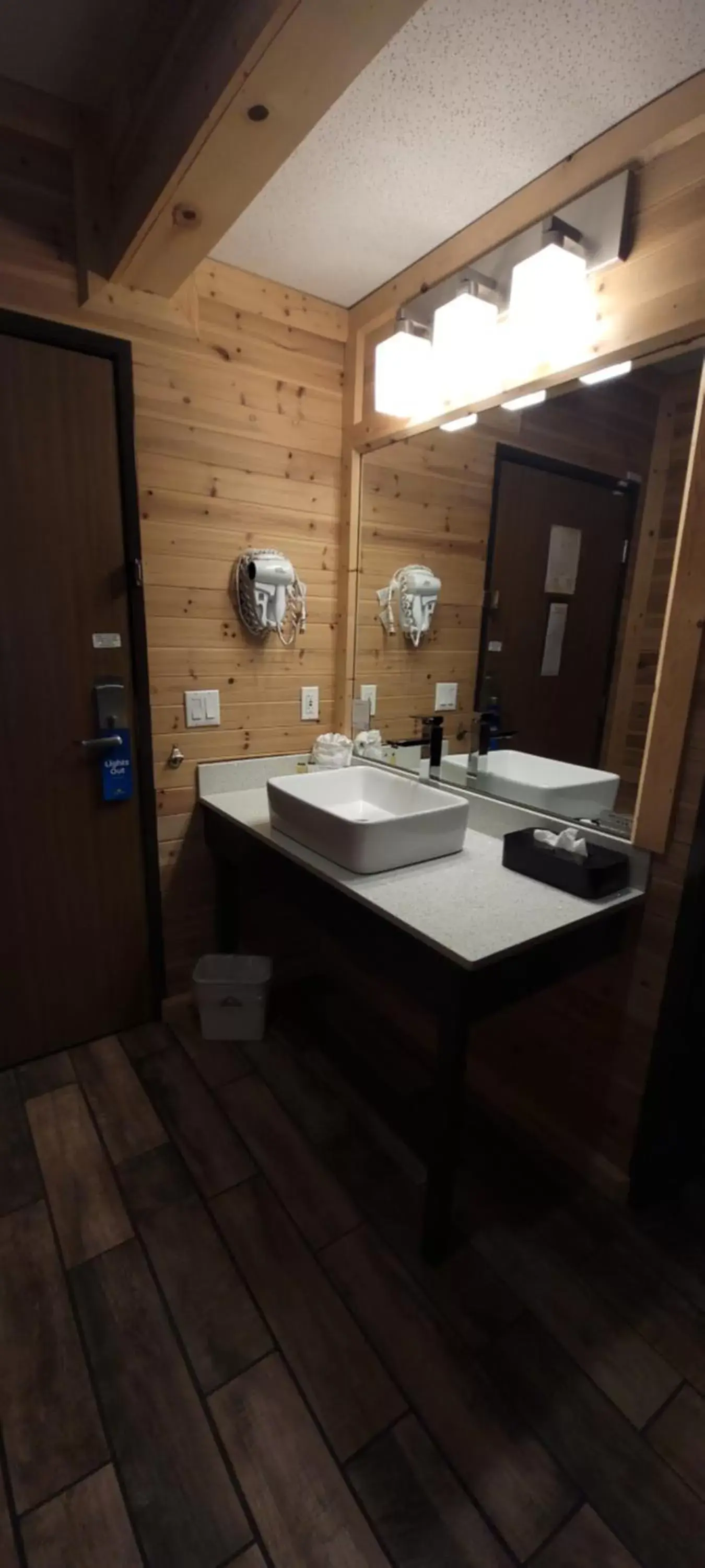 Bathroom in Days Inn by Wyndham Cadillac