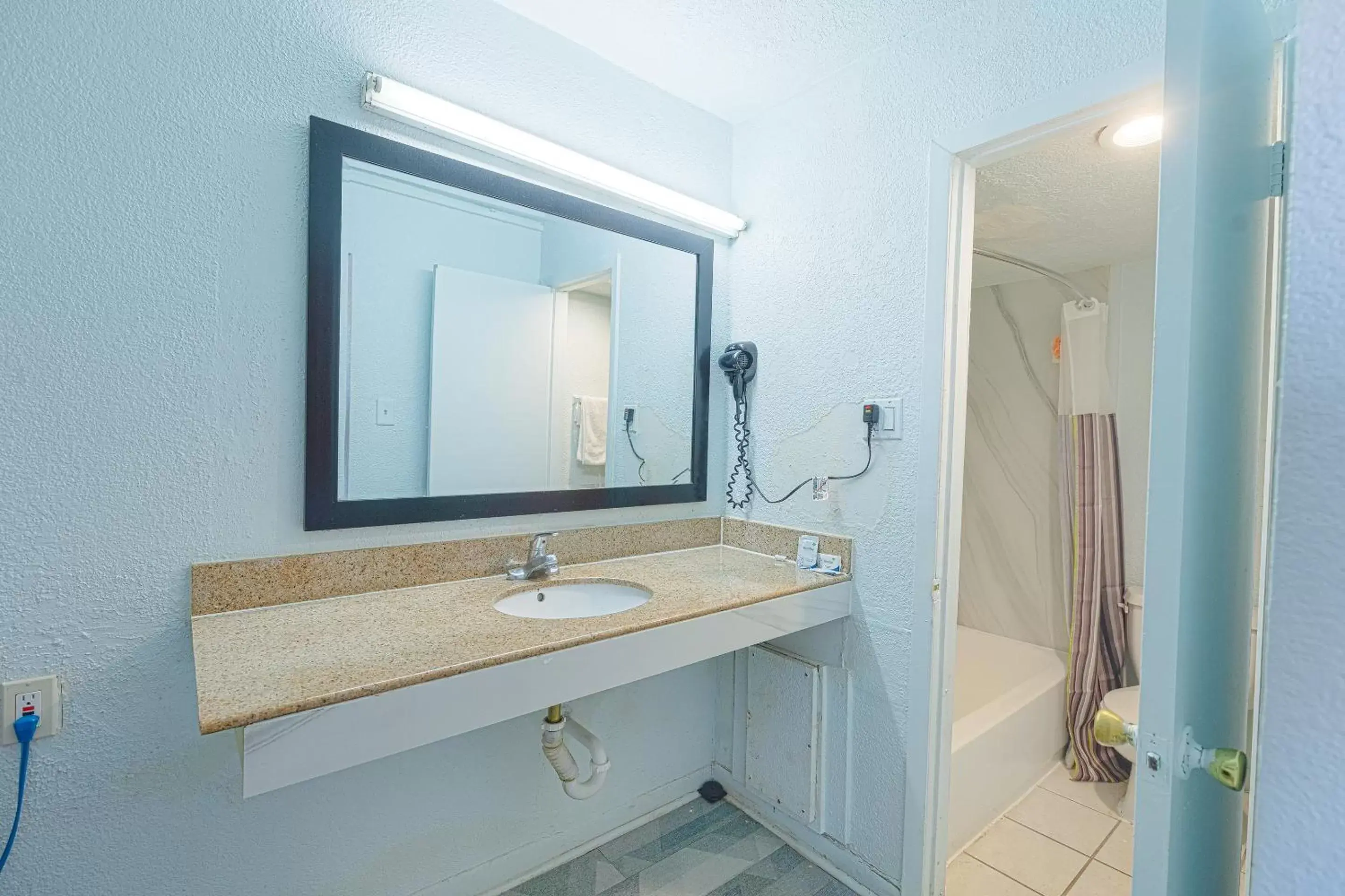 Bathroom in OYO Hotel Houston, TX near Medical Center NRG Stadium