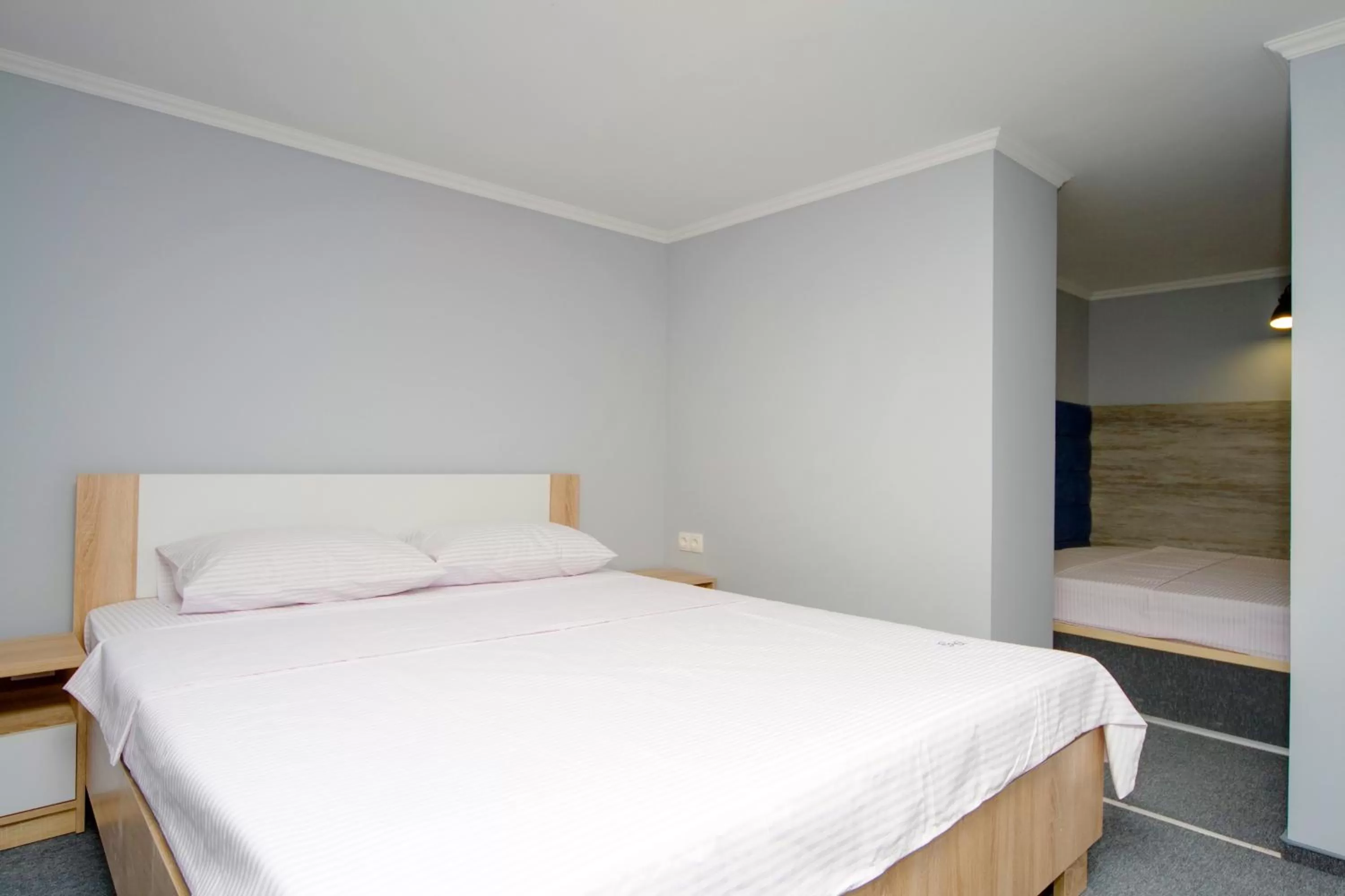 Bed in Grand Apartments