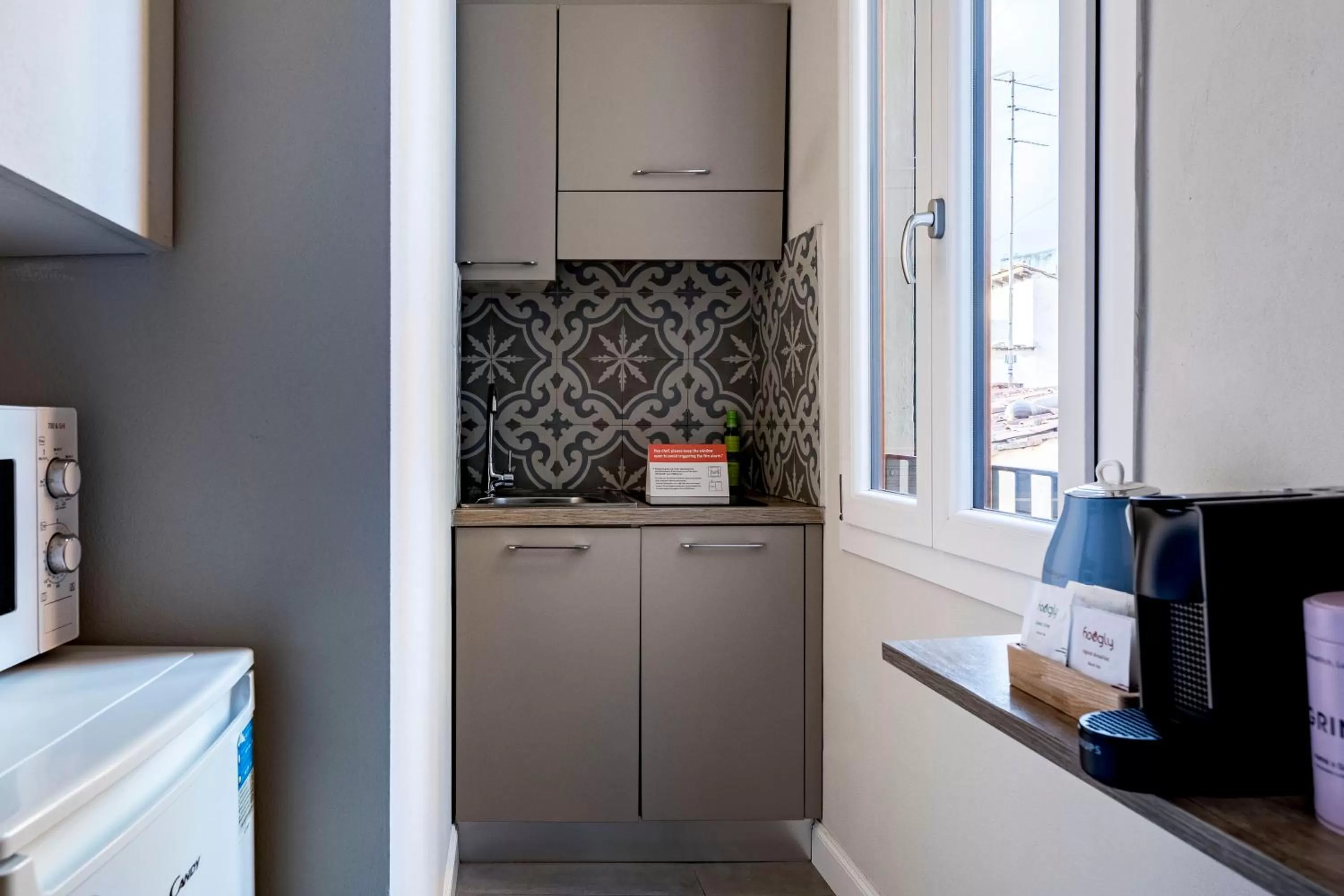 Kitchen or kitchenette in Numa Florence Fiore