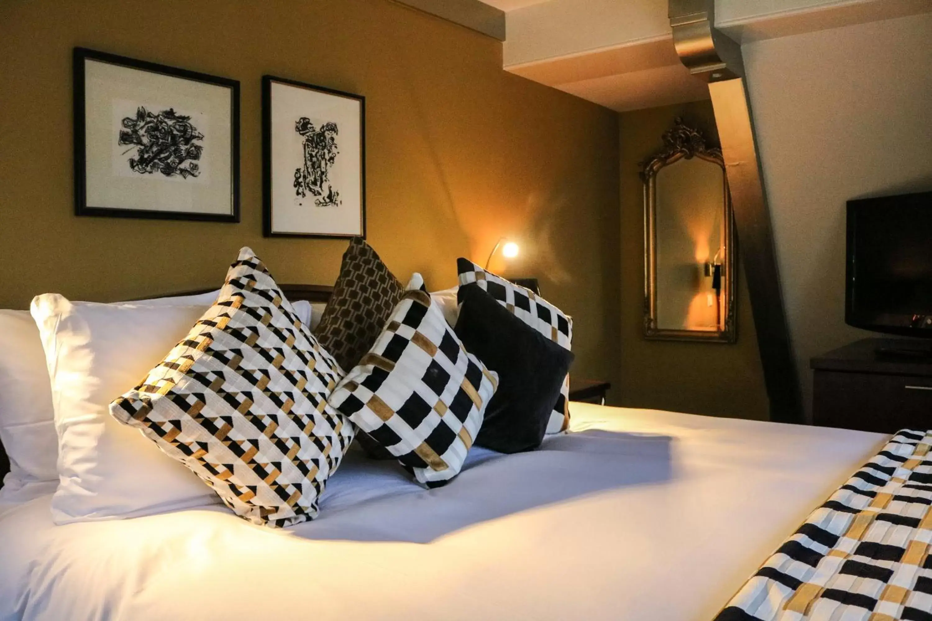 Bed in Ambassade Hotel