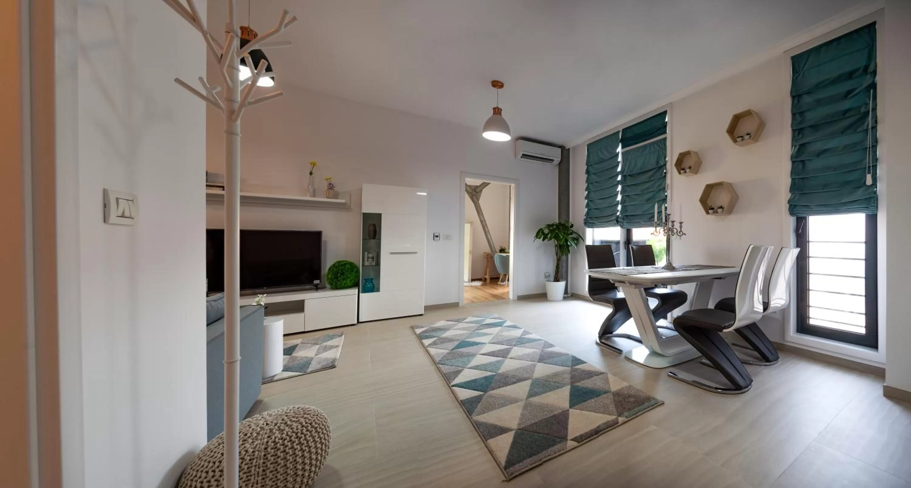 Communal lounge/ TV room, TV/Entertainment Center in Steel Residence