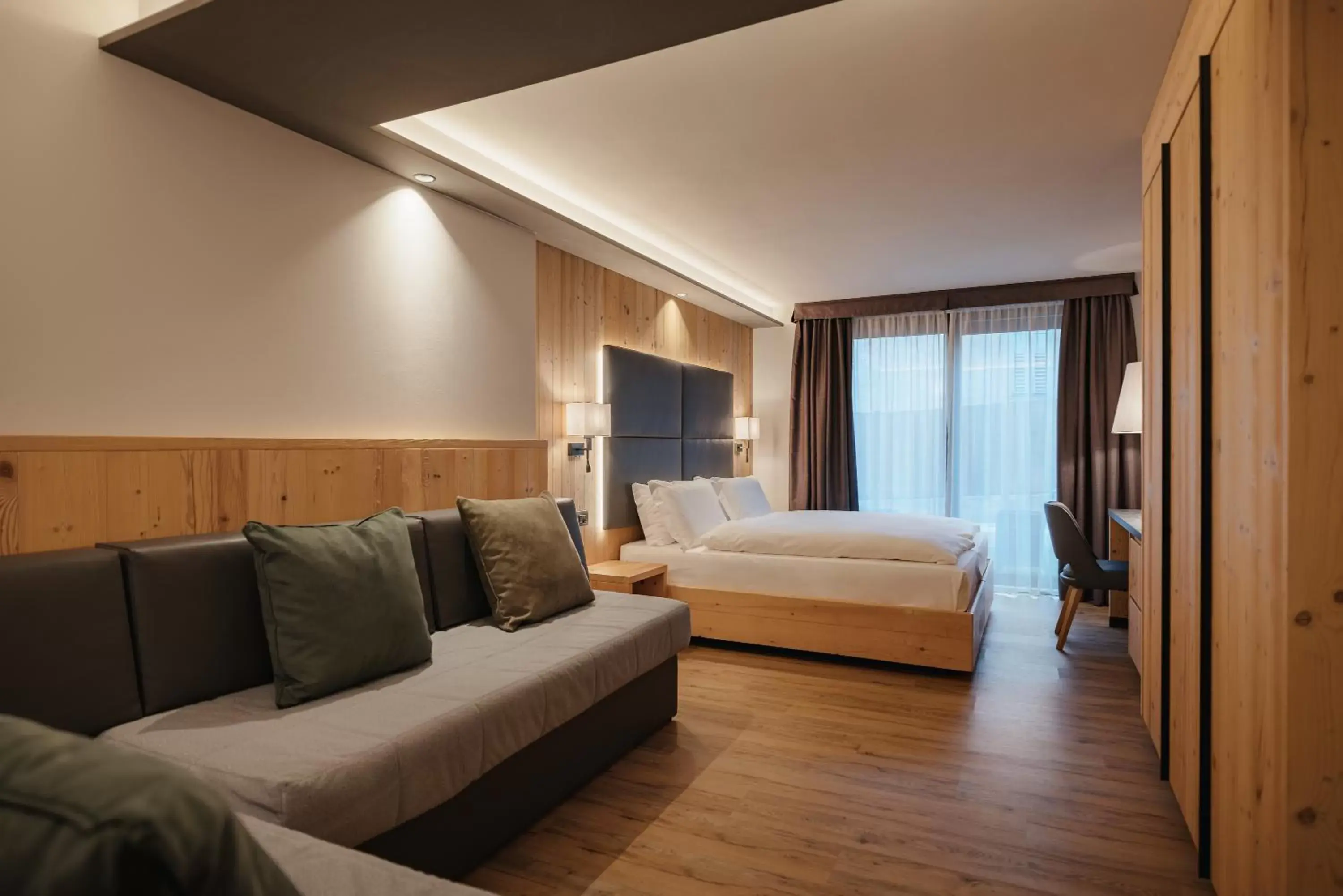Bedroom, Seating Area in Hotel La Montanara Predazzo