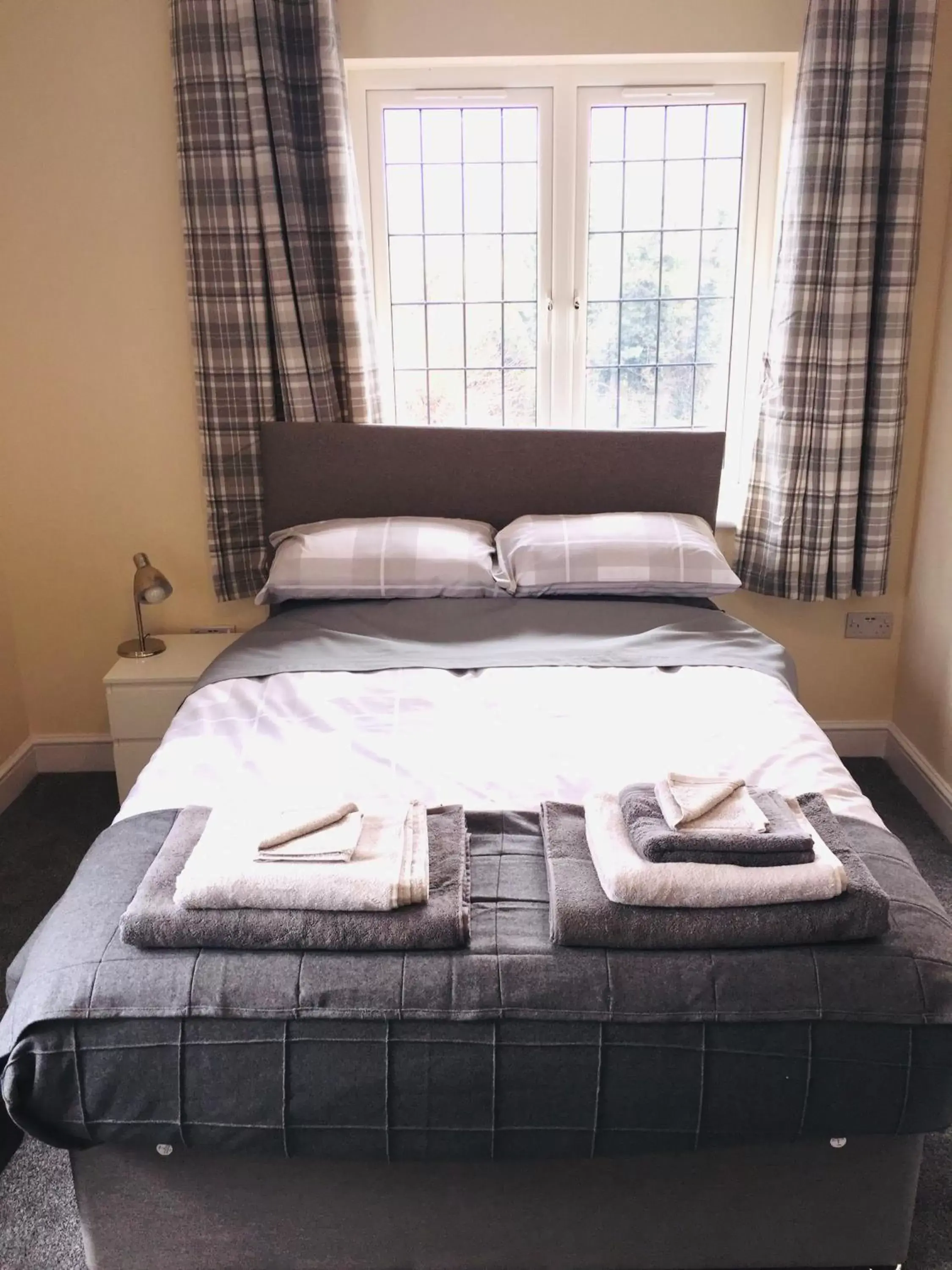 Bed in The Woodhouse Inn