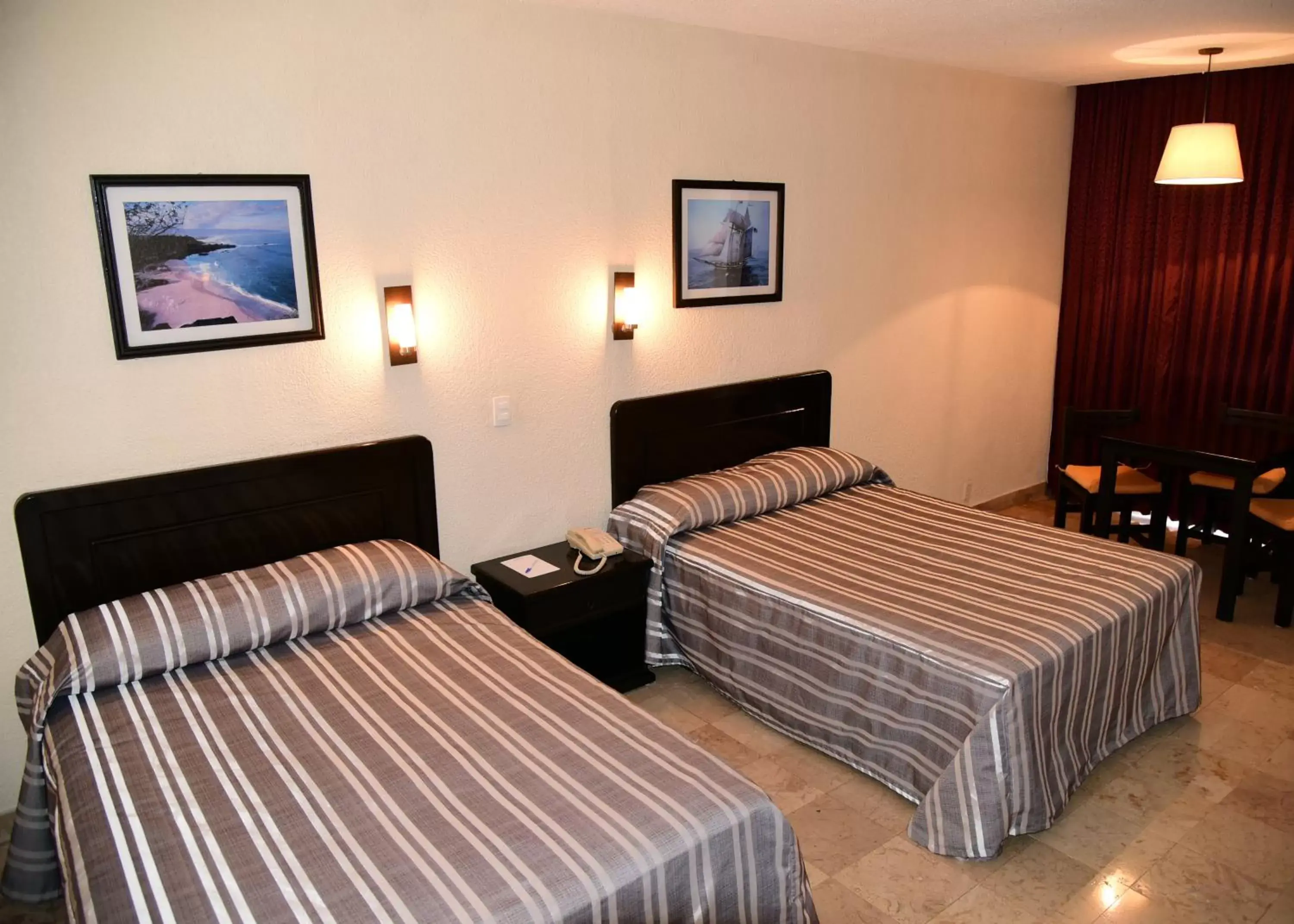 Photo of the whole room, Bed in Amarea Hotel Acapulco