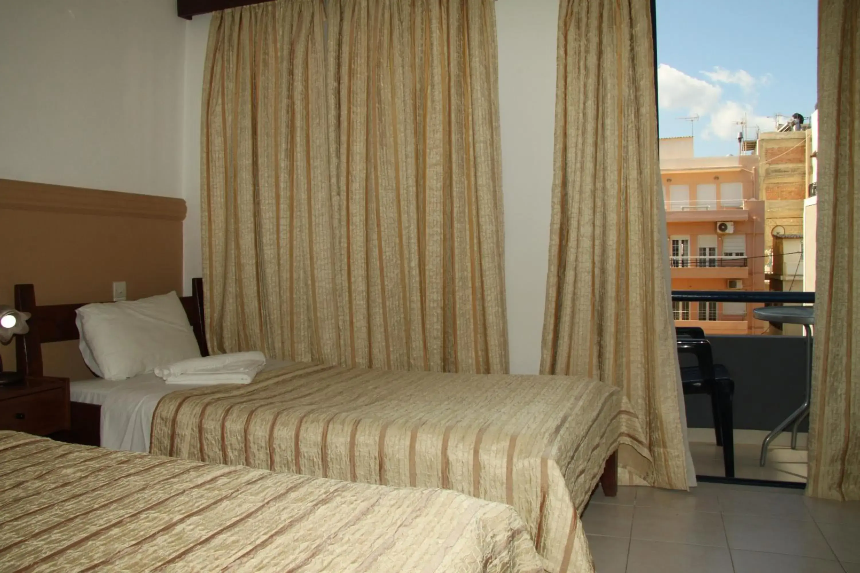 Bedroom, Bed in Danaos Hotel