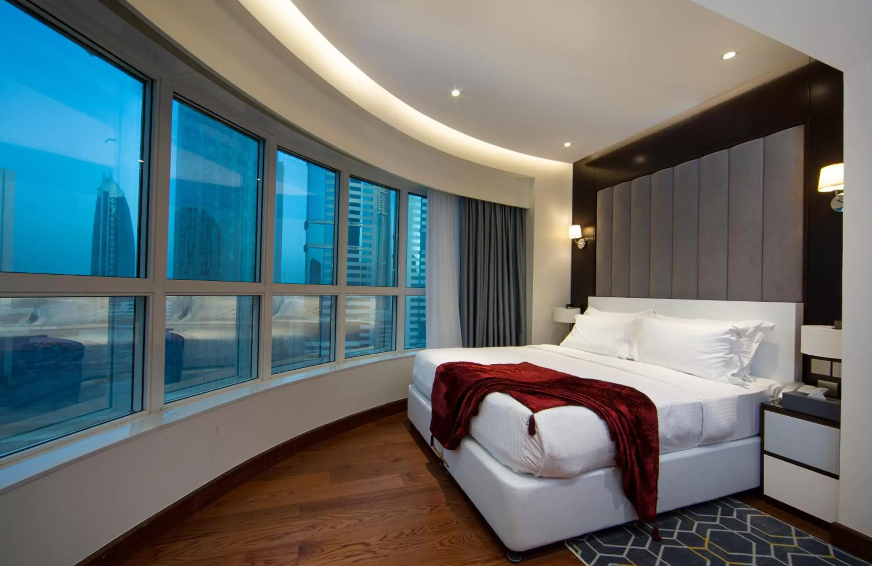 Bed in Number One Tower Suites Hotel