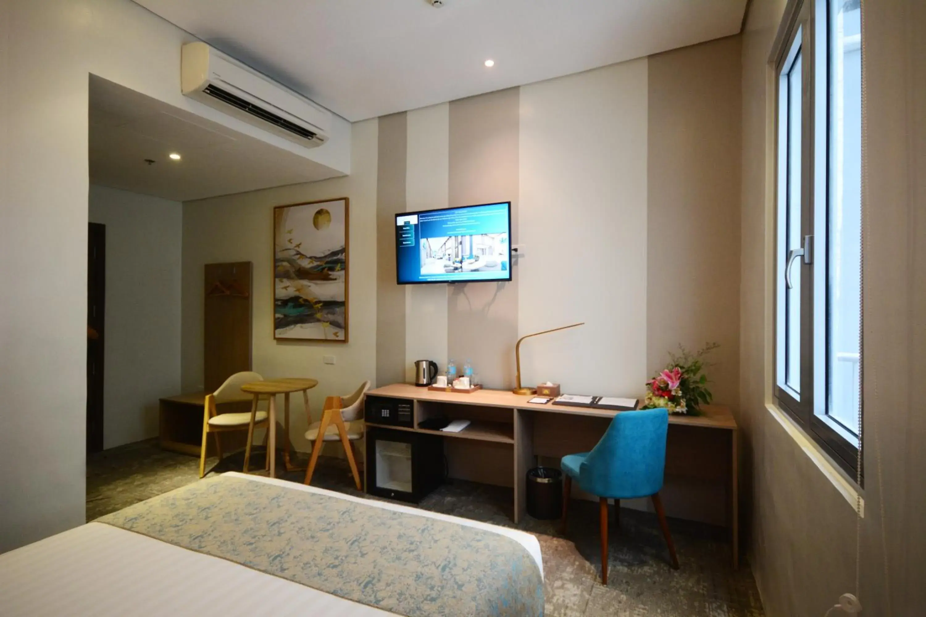 TV and multimedia, TV/Entertainment Center in Blue Lotus Hotel