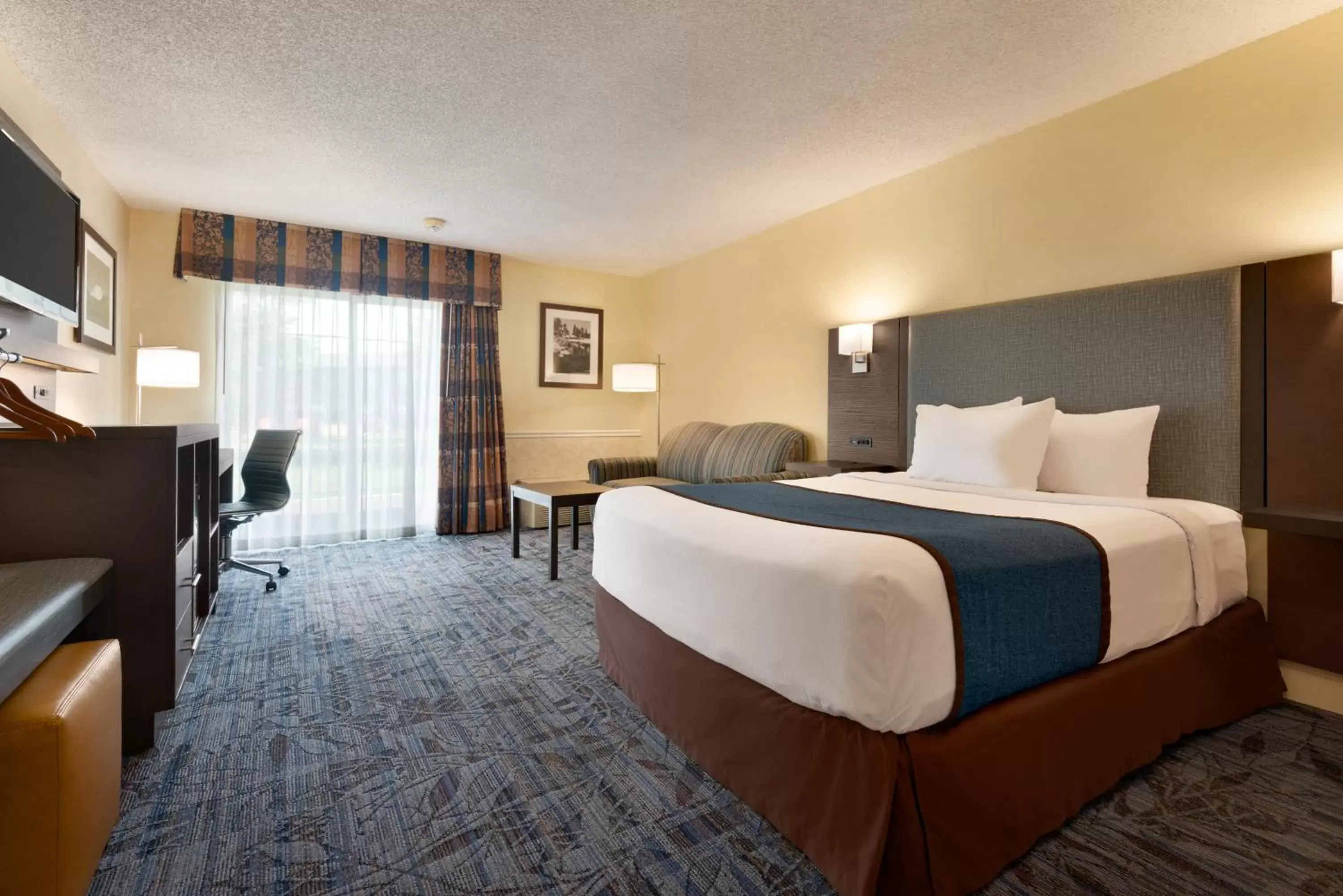 Bed in Ramada by Wyndham Spokane Airport