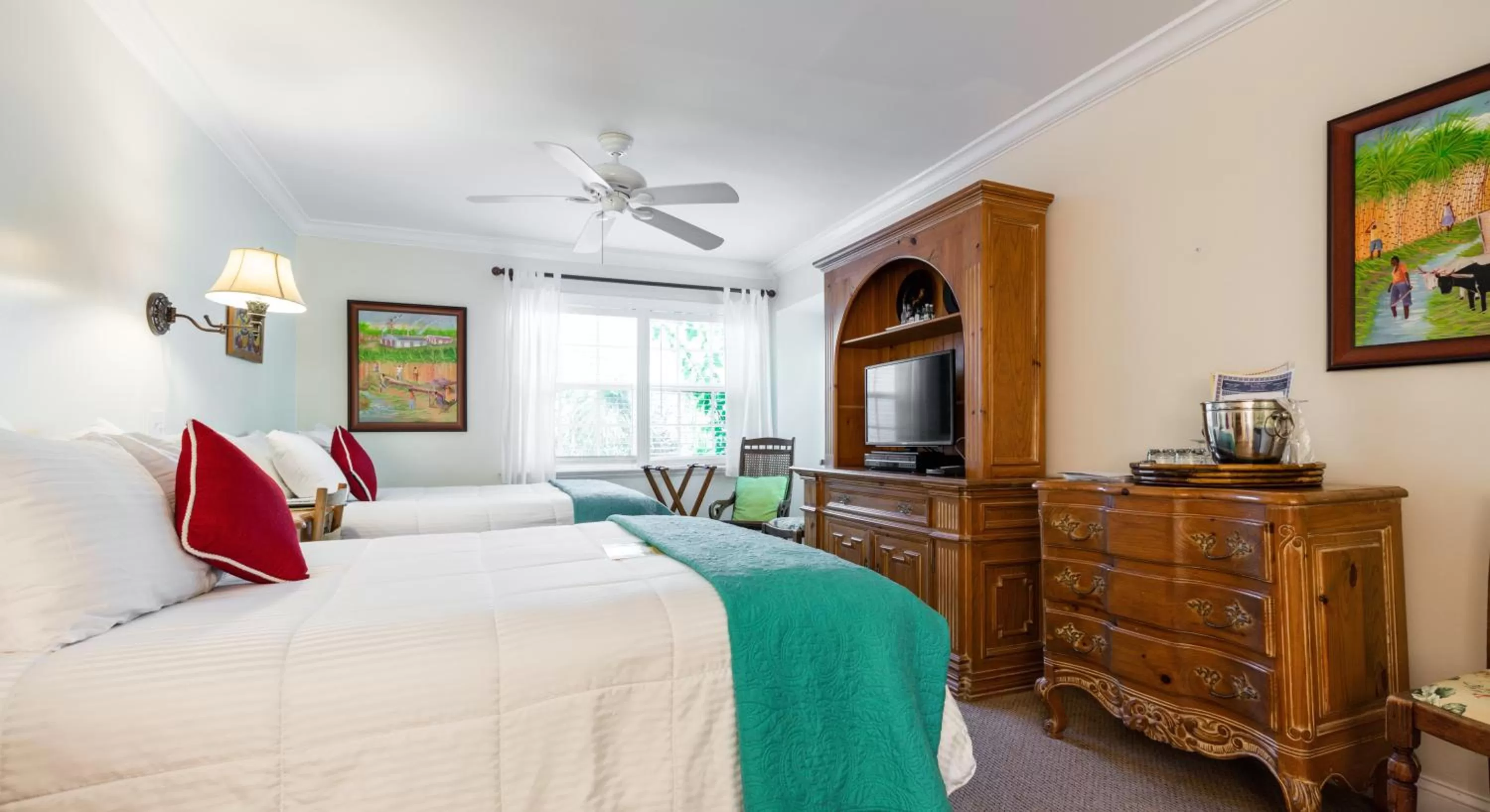 Bedroom, Bed in The Caribbean Court Boutique Hotel