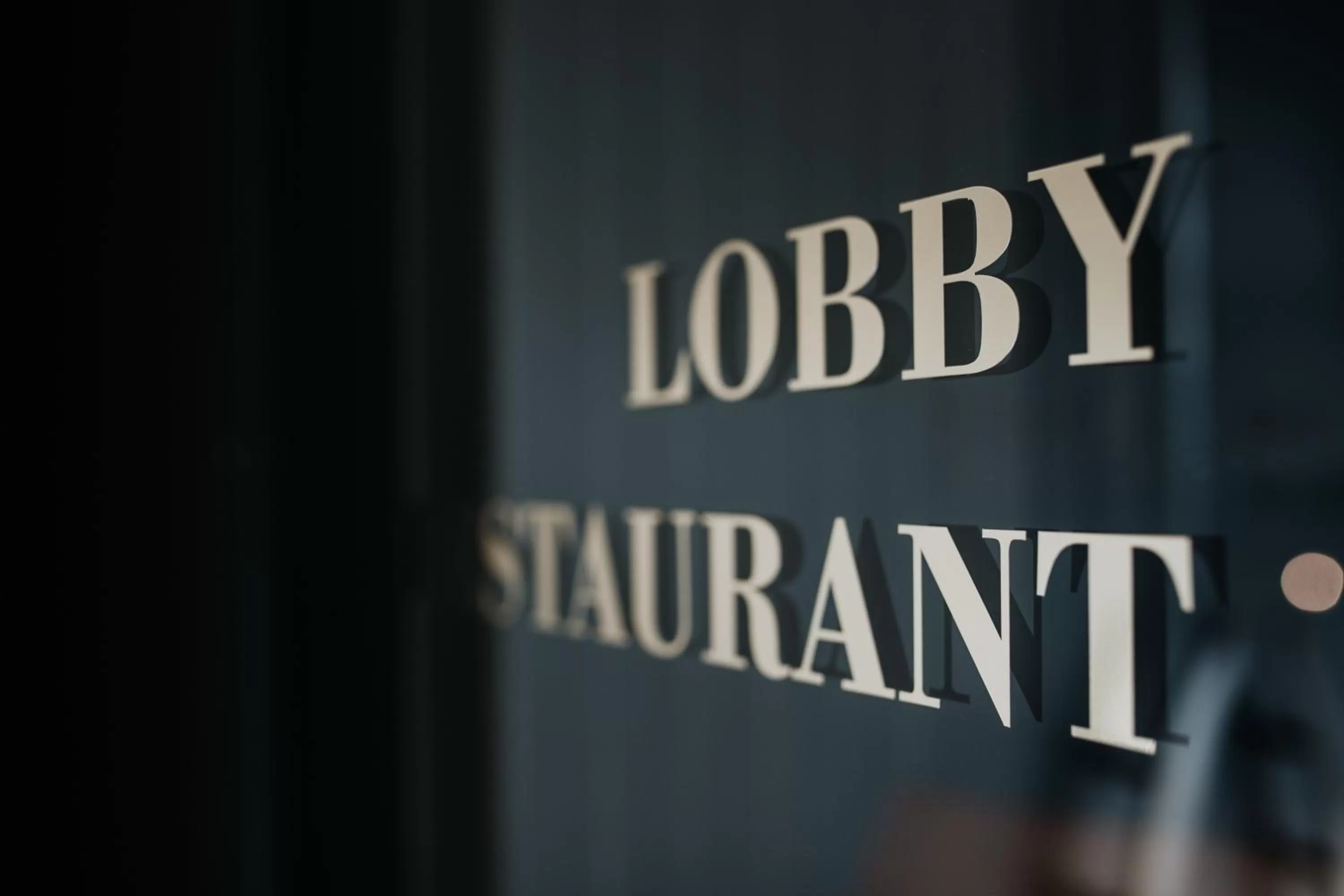 Property logo or sign in Magni Boutique Hotel