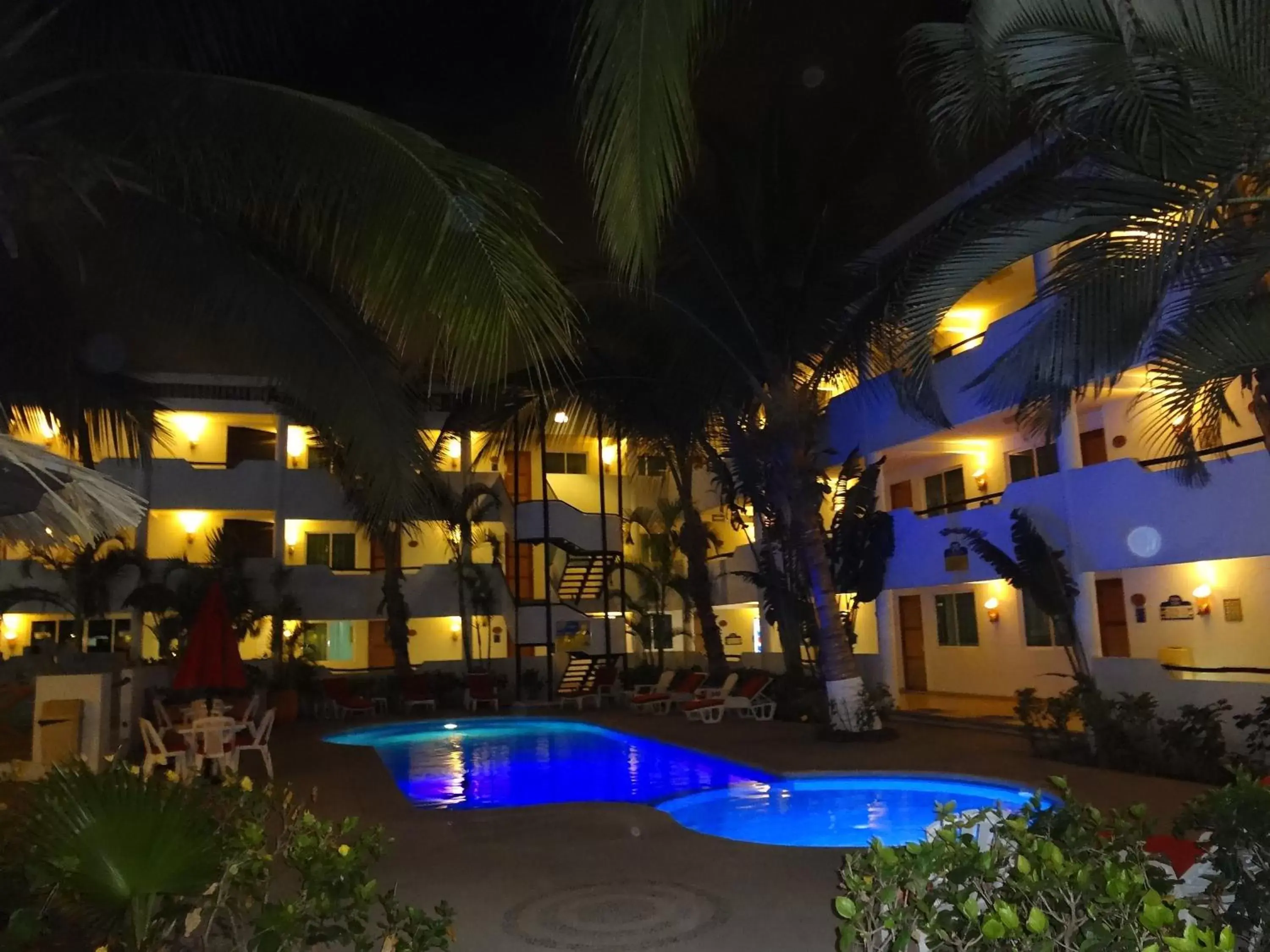 Property building, Swimming Pool in Hotel Palapa Palace Inn