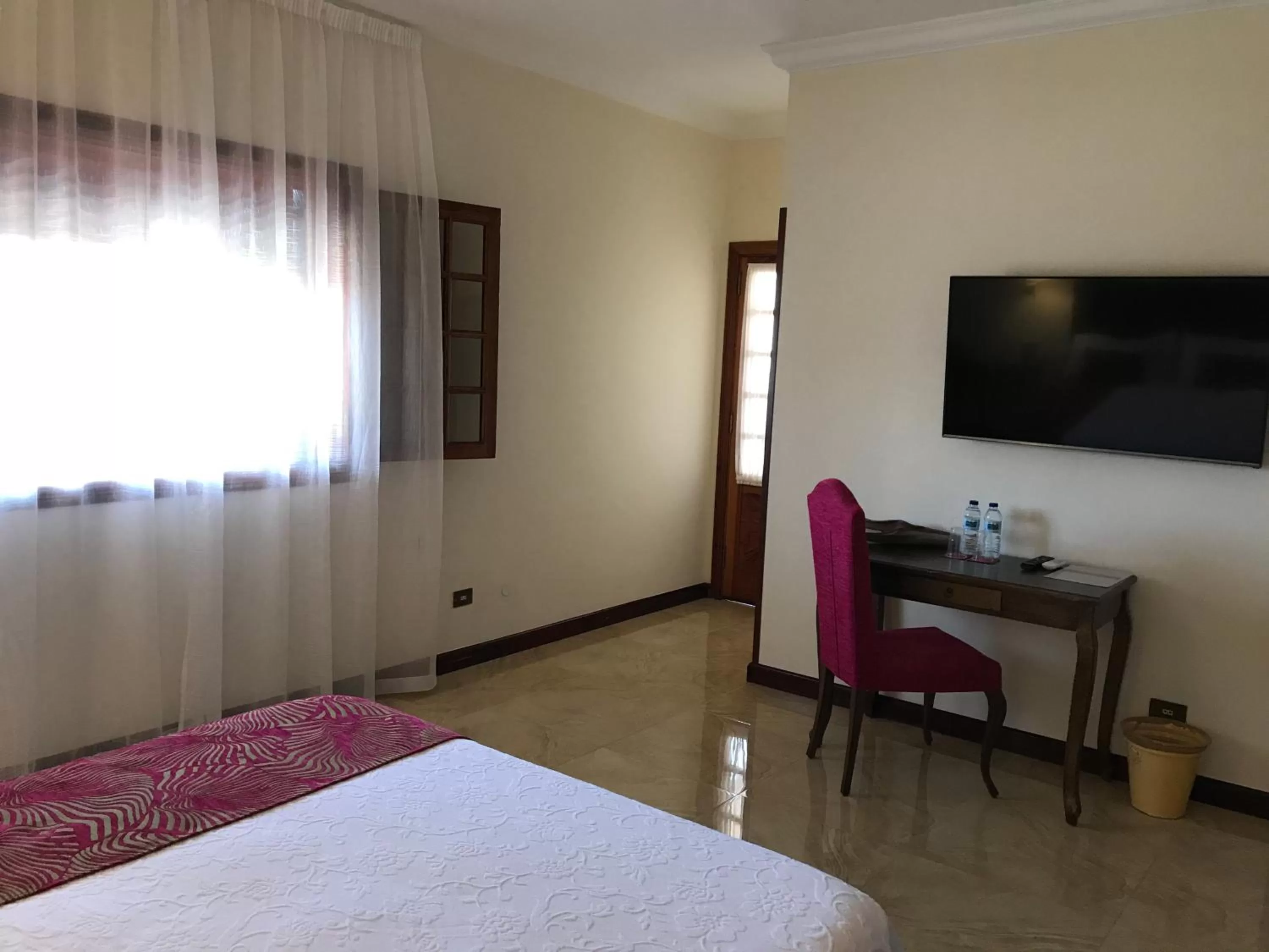 Communal lounge/ TV room, Bed in Il Sogno di Gio de la Laguna