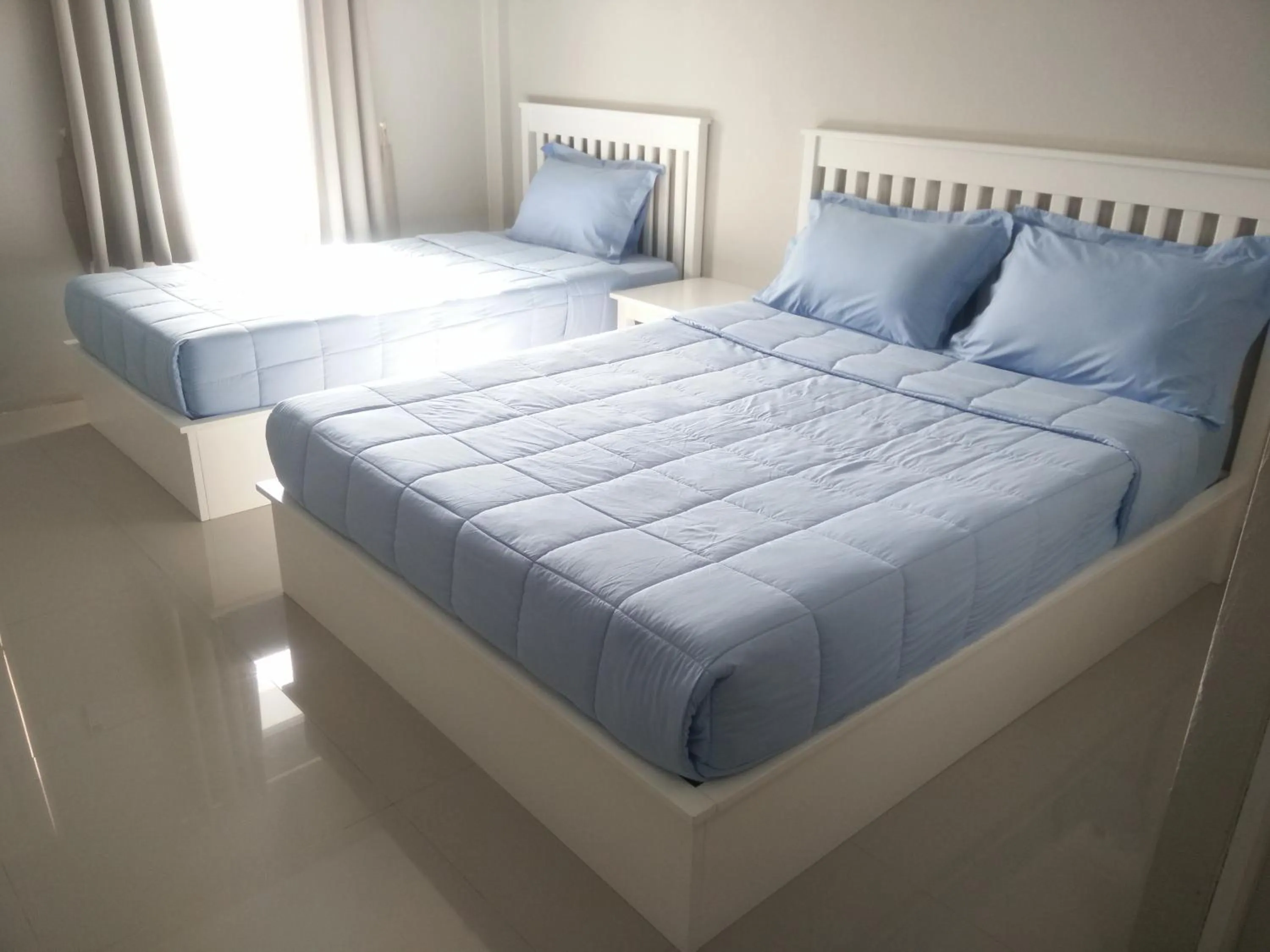 Bed in Vanilla Ville Resort