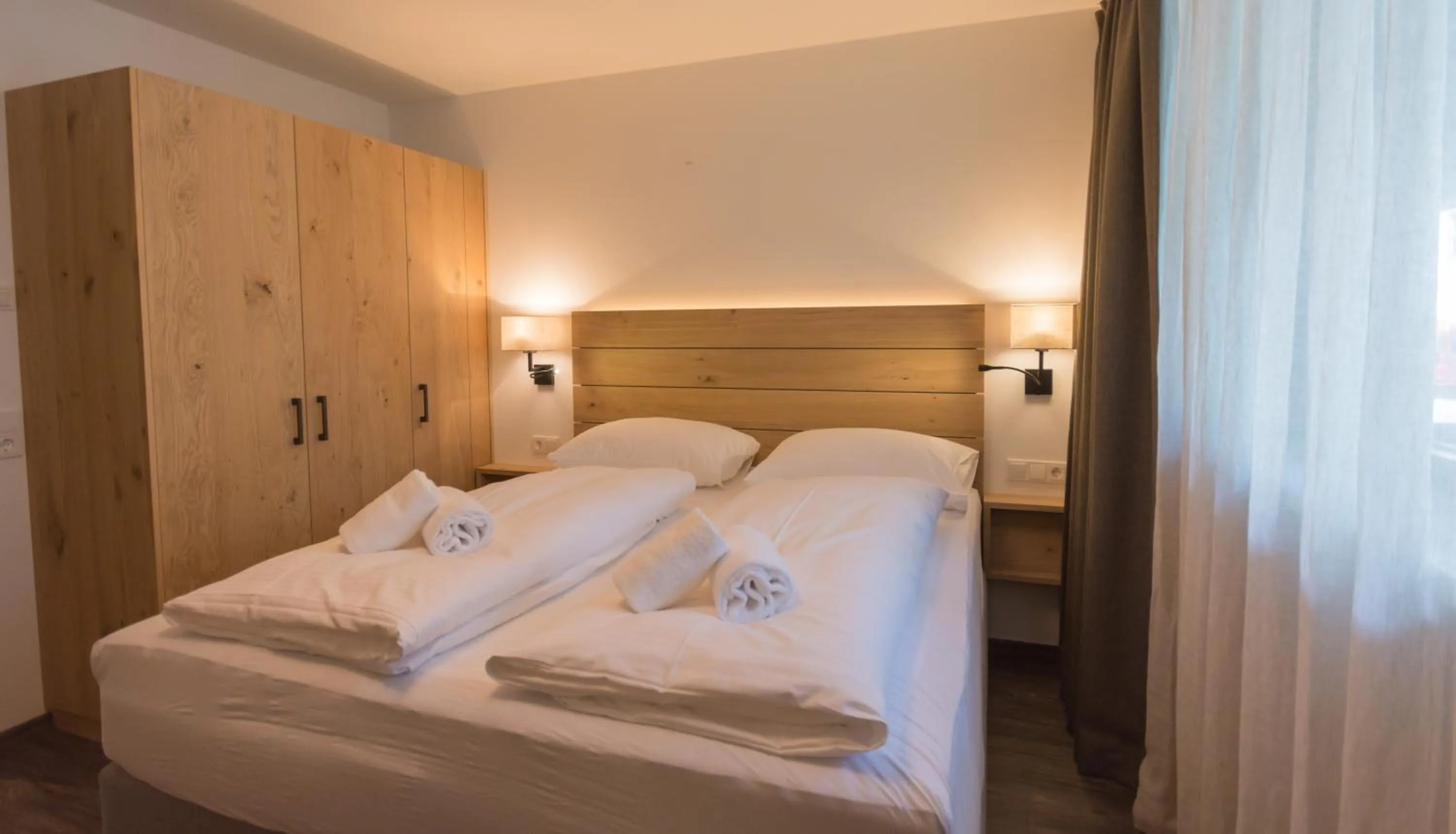 Bedroom, Bed in Schönblick Residence - Absolut Alpine Apartments