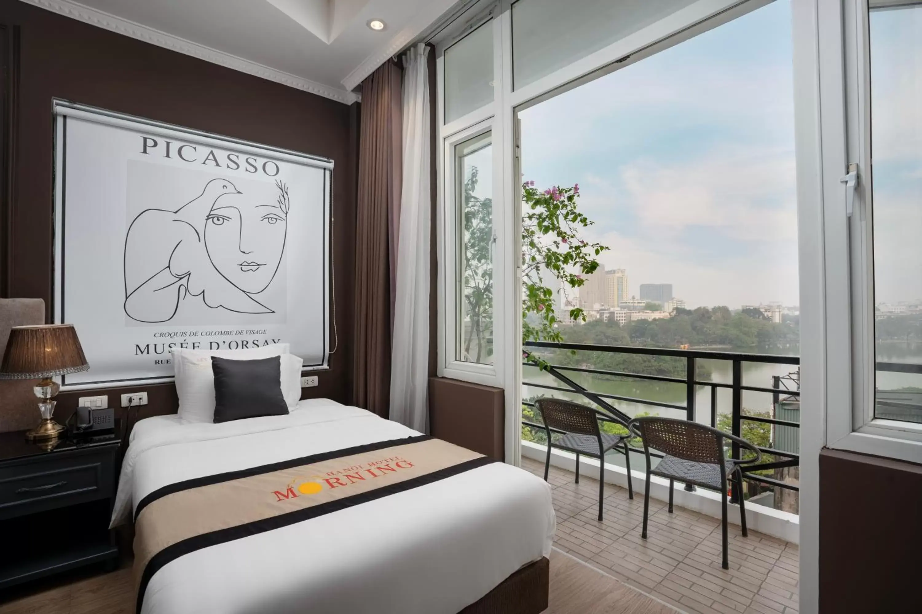 Triple Room with Lake View in Hanoi Morning Hotel Triple Room with Lake View in Hanoi Morning Hotel