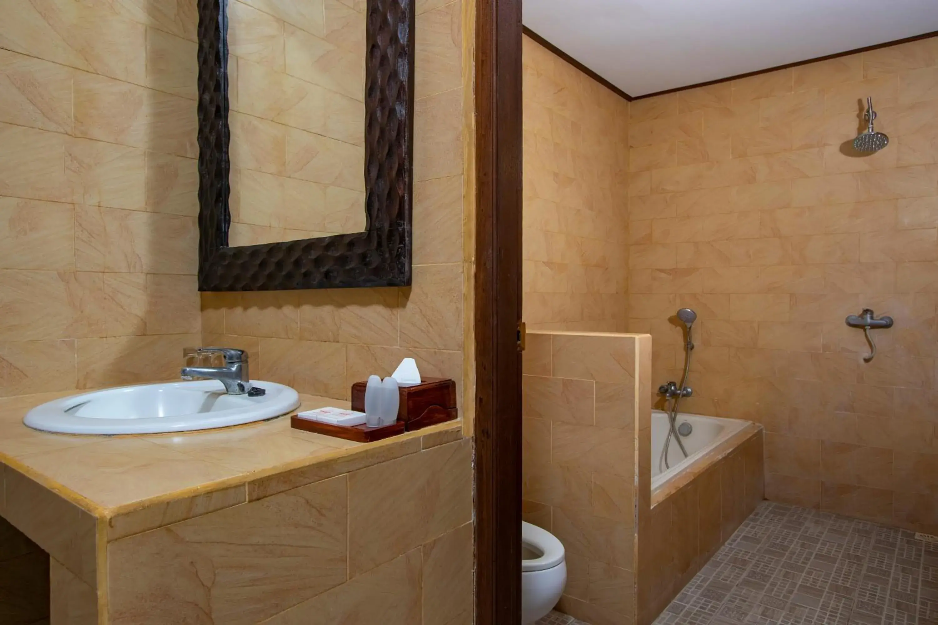 Bathroom in Suriwathi Hotel