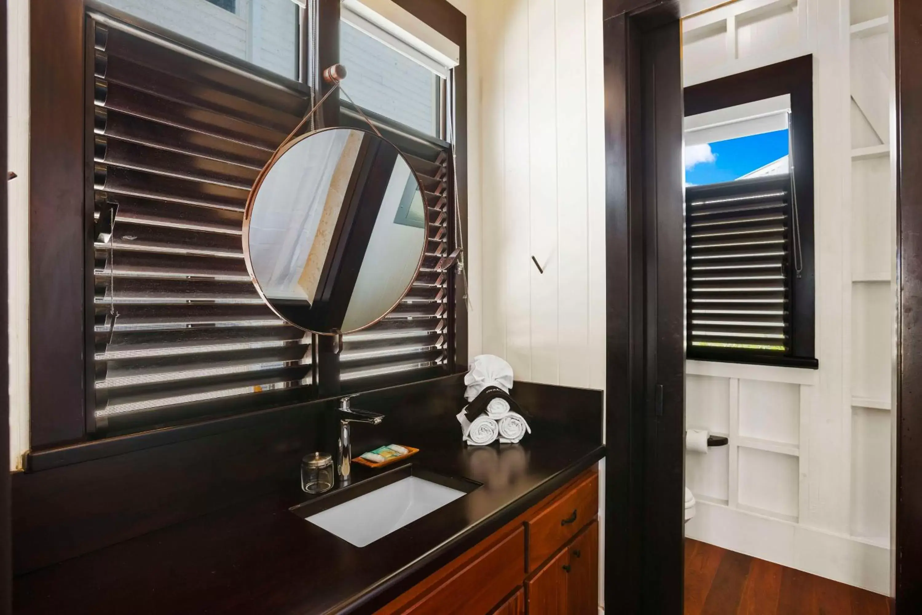 Living room, Bathroom in Mahogany Bay Resort and Beach Club, Curio Collection