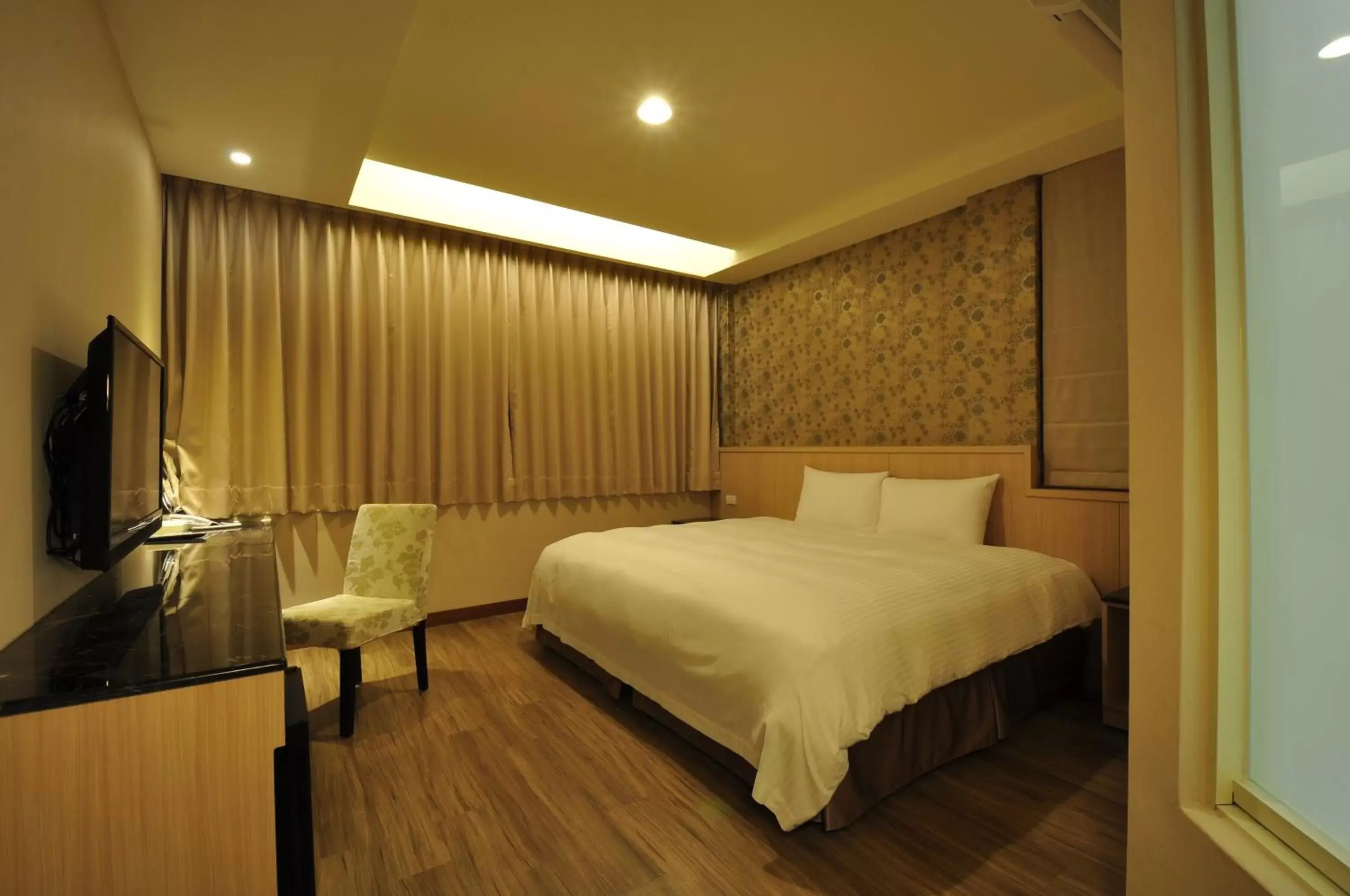 Bed in Fupin Hotel