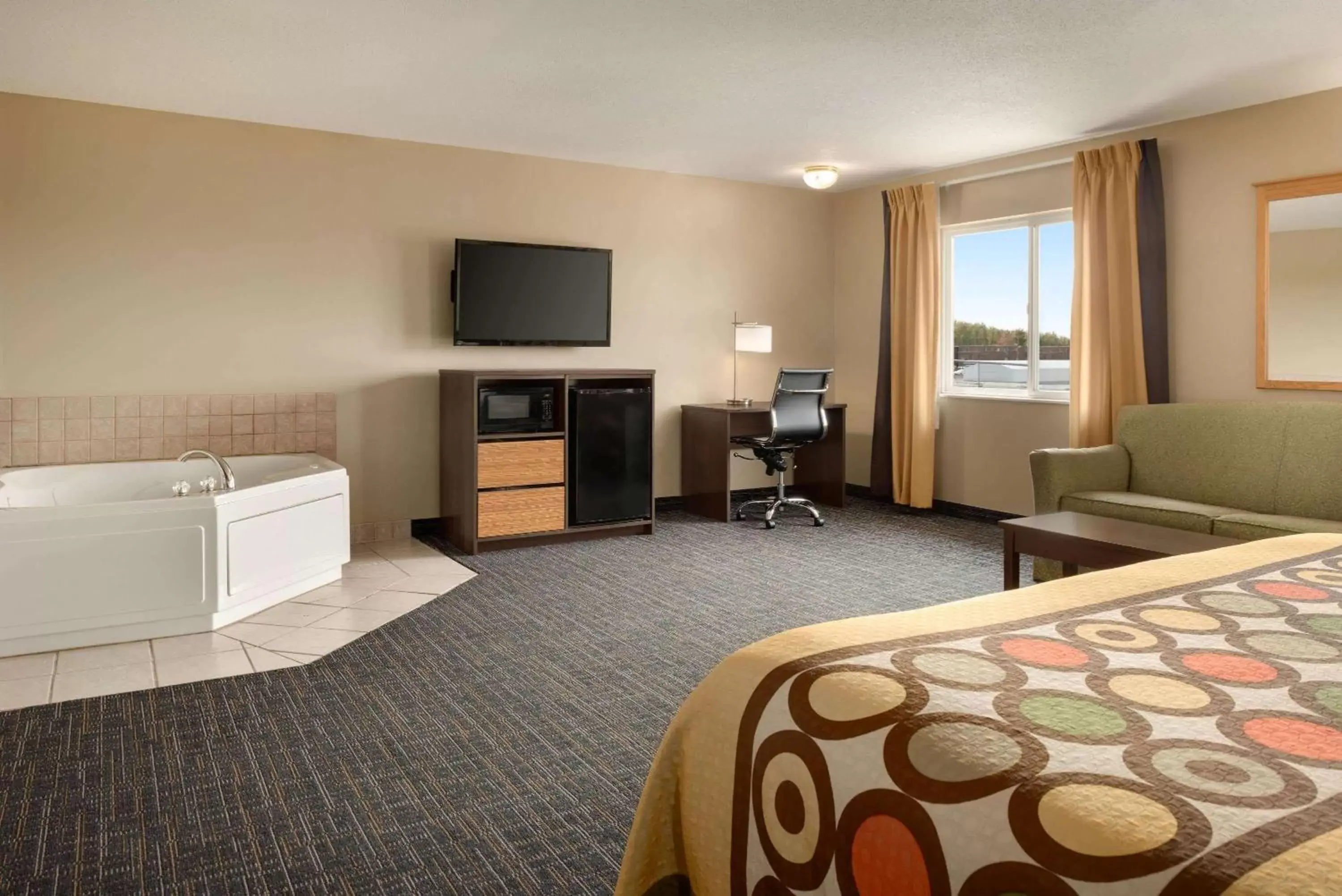 Photo of the whole room, TV/Entertainment Center in Super 8 by Wyndham Sioux Falls