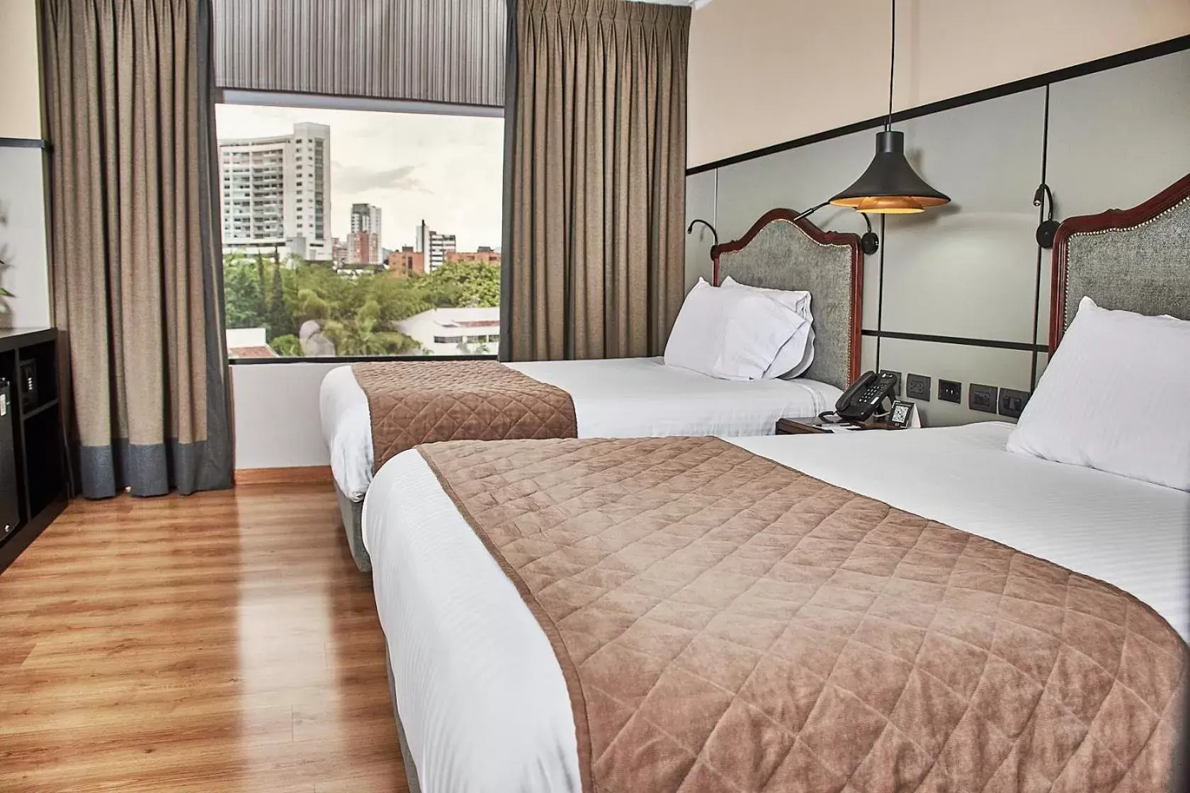 Property building, Bed in Hotel Poblado Plaza