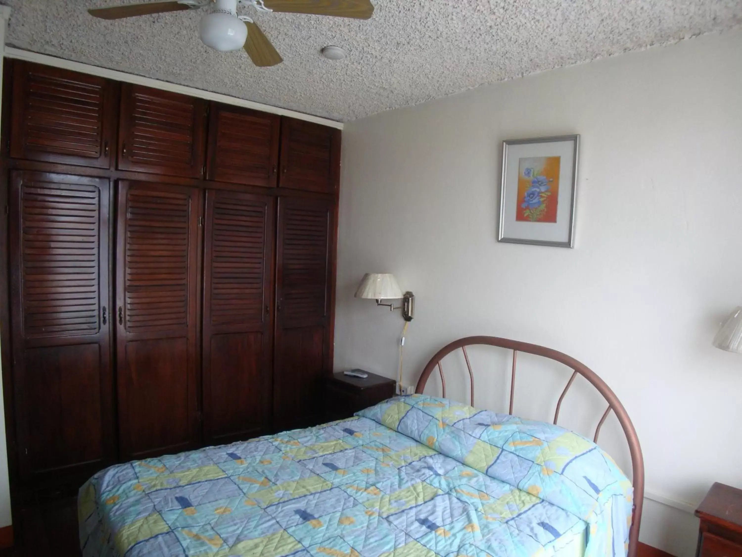 Bedroom, Bed in Hotel La Guaria Inn & Suites