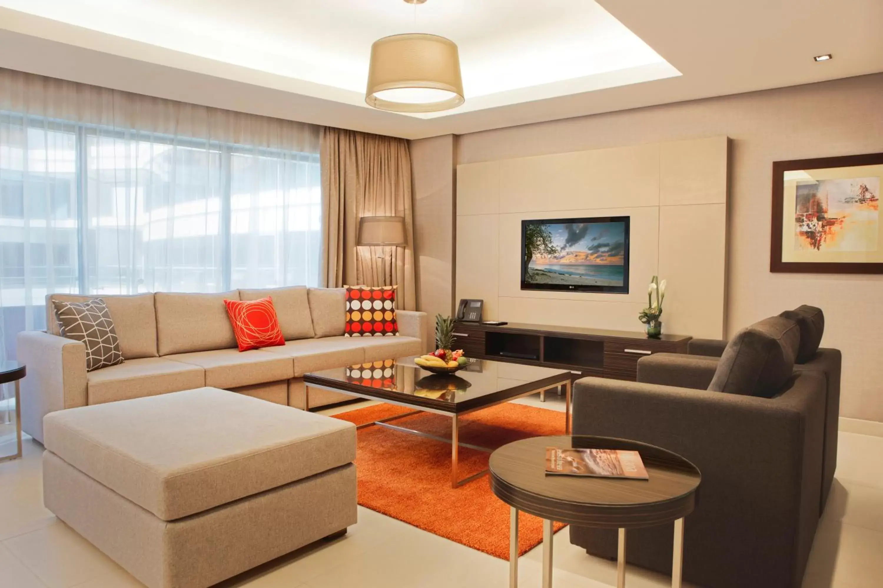 TV and multimedia, Seating Area in Majestic Arjaan by Rotana – Manama