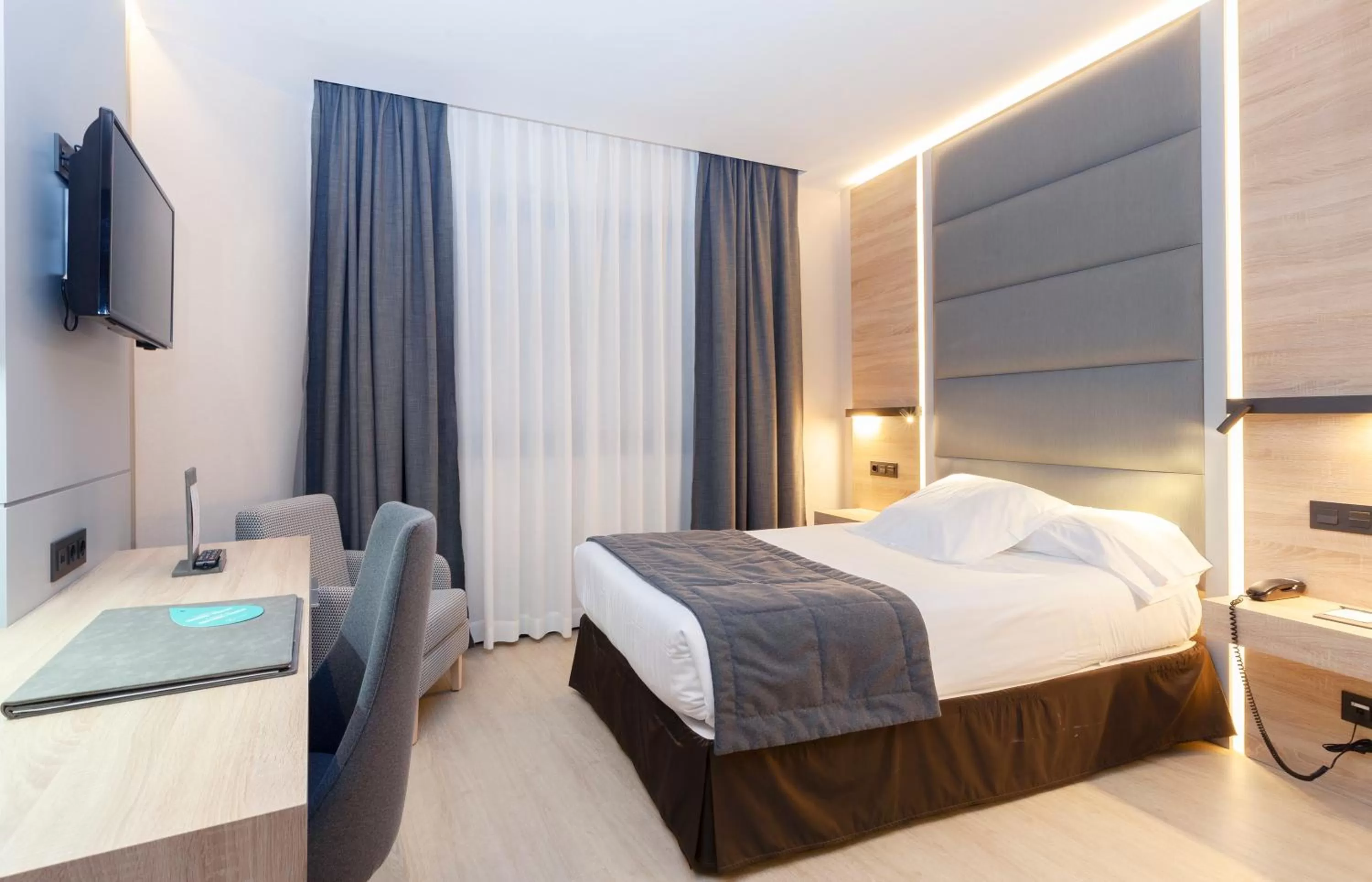 Bed in Hotel Liabeny