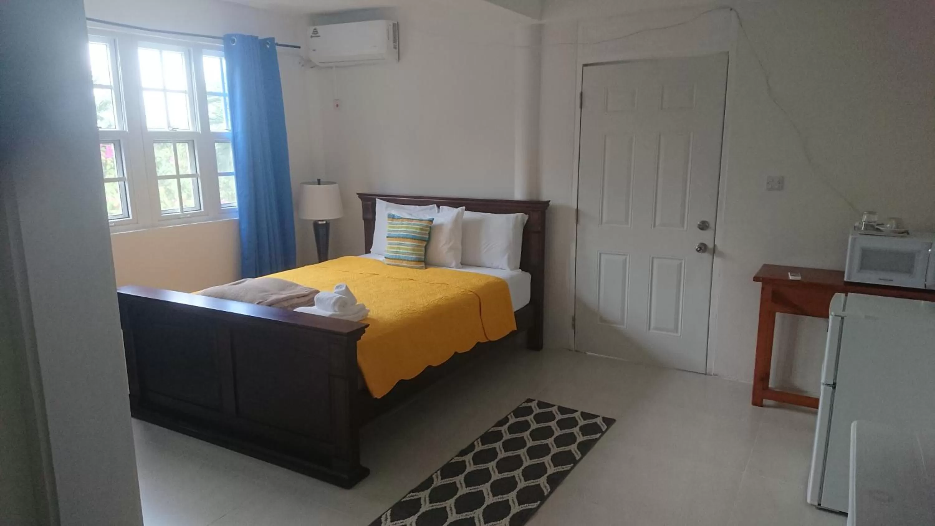 Bed in Classique International in Dominica