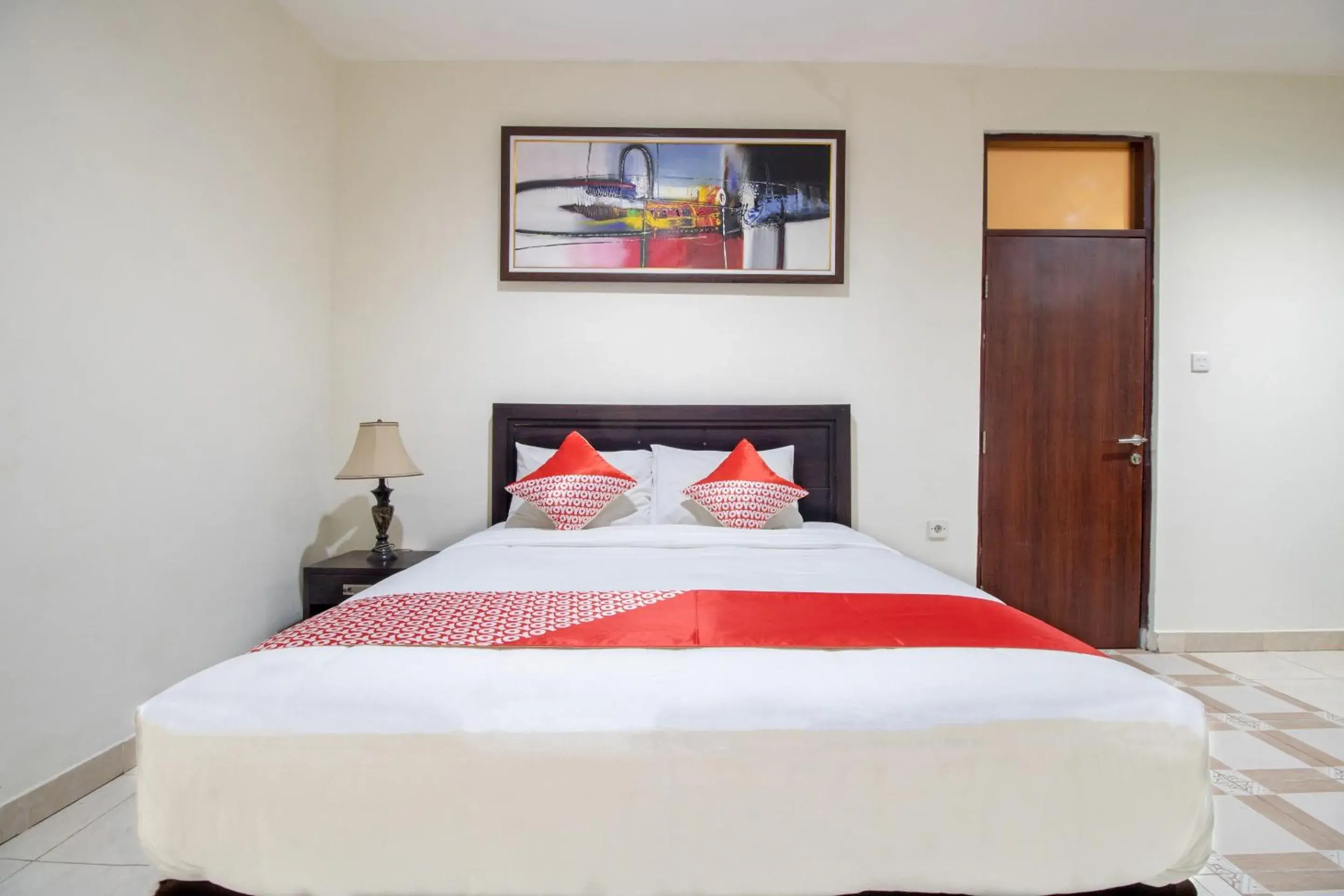 Bedroom, Bed in SUPER OYO Flagship 2688 Guntur Hotel