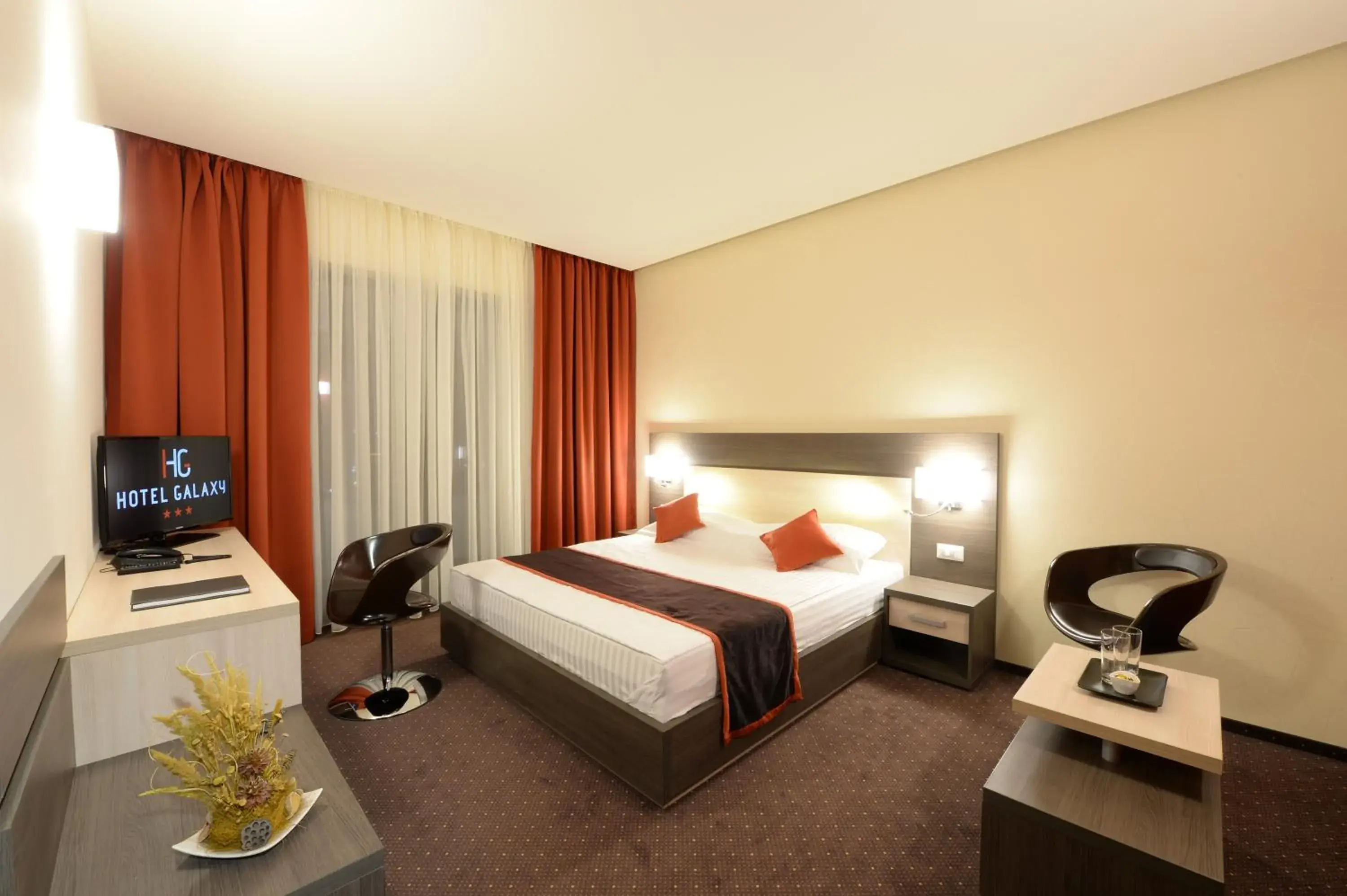 Photo of the whole room, Bed in Hotel Galaxy Photo of the whole room, Bed in Hotel Galaxy