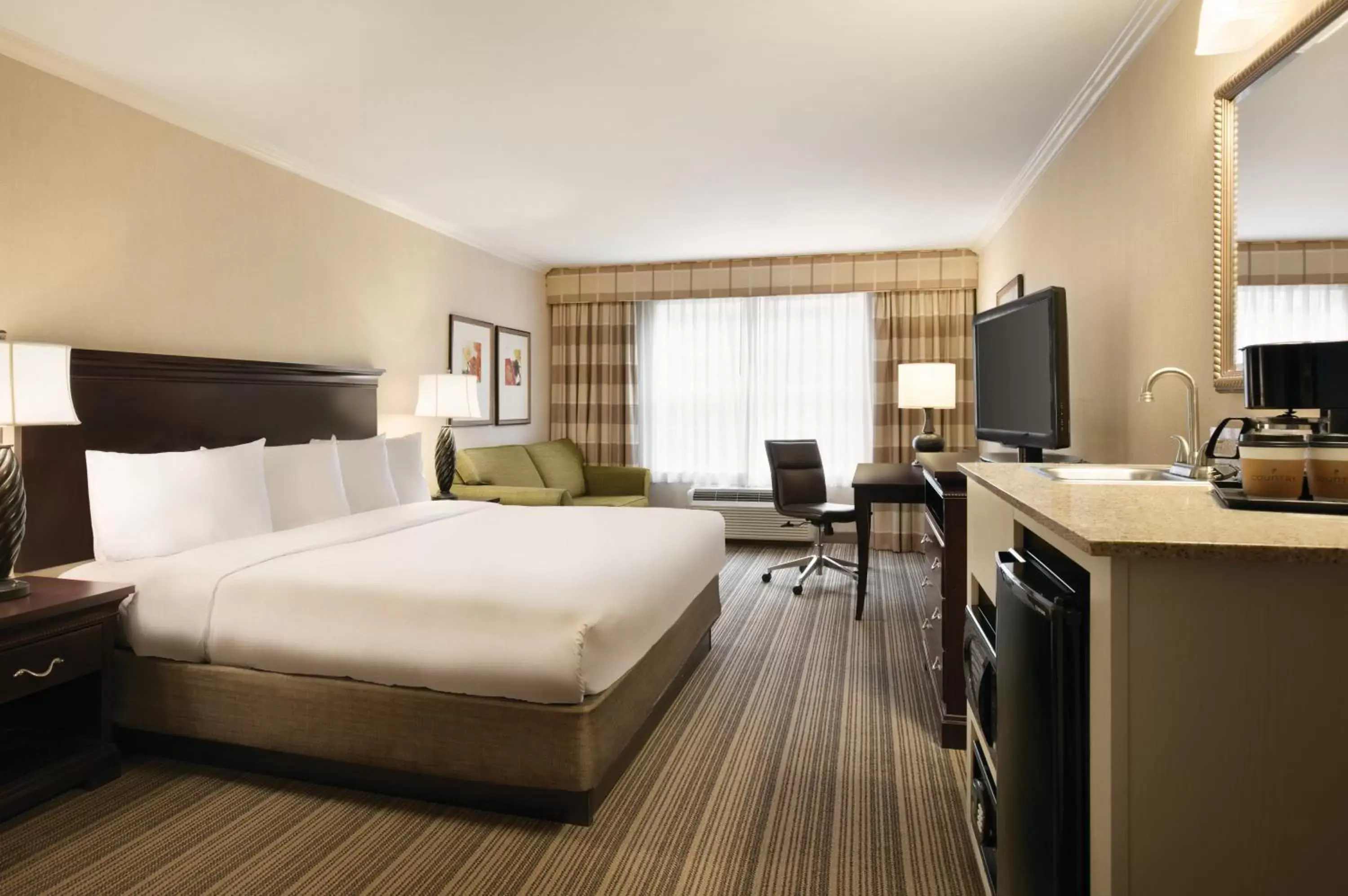 Photo of the whole room in Country Inn & Suites by Radisson, Atlanta Airport North, GA