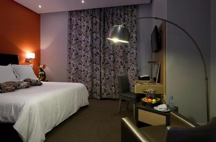 Bed in Le Sphinx Boutique Hôtel